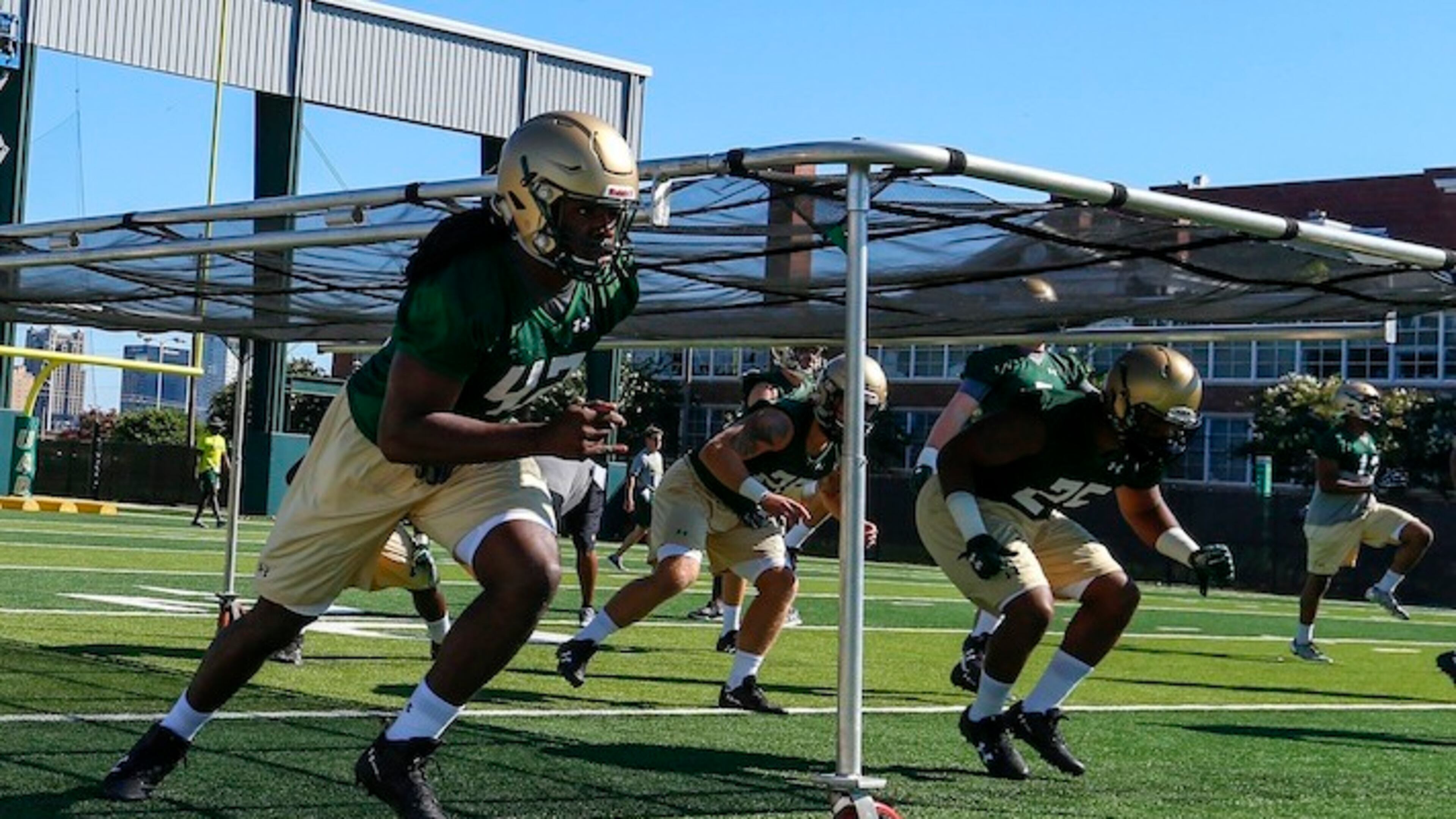 Shaq Jones (42) runs through drills during the first practice as UAB's football program starts up again after two years, Monday, July 31, 2017, in Birmingham, Ala. (AP Photo/Butch Dill)