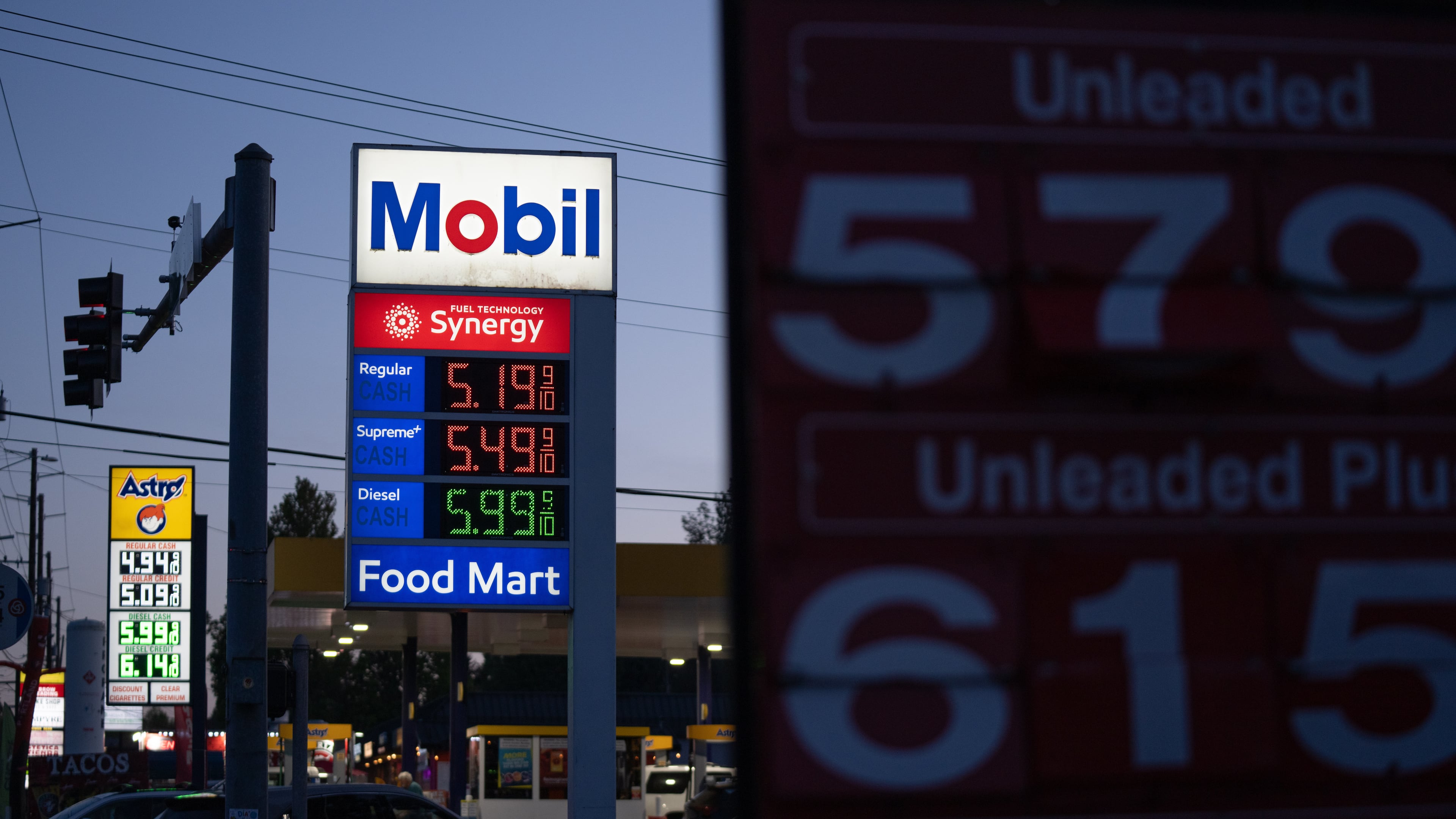Gasoline prices are displayed at a Mobil gas station on Wednesday, April 29, 2026, in Portland, Ore. (AP Photo/Jenny Kane)