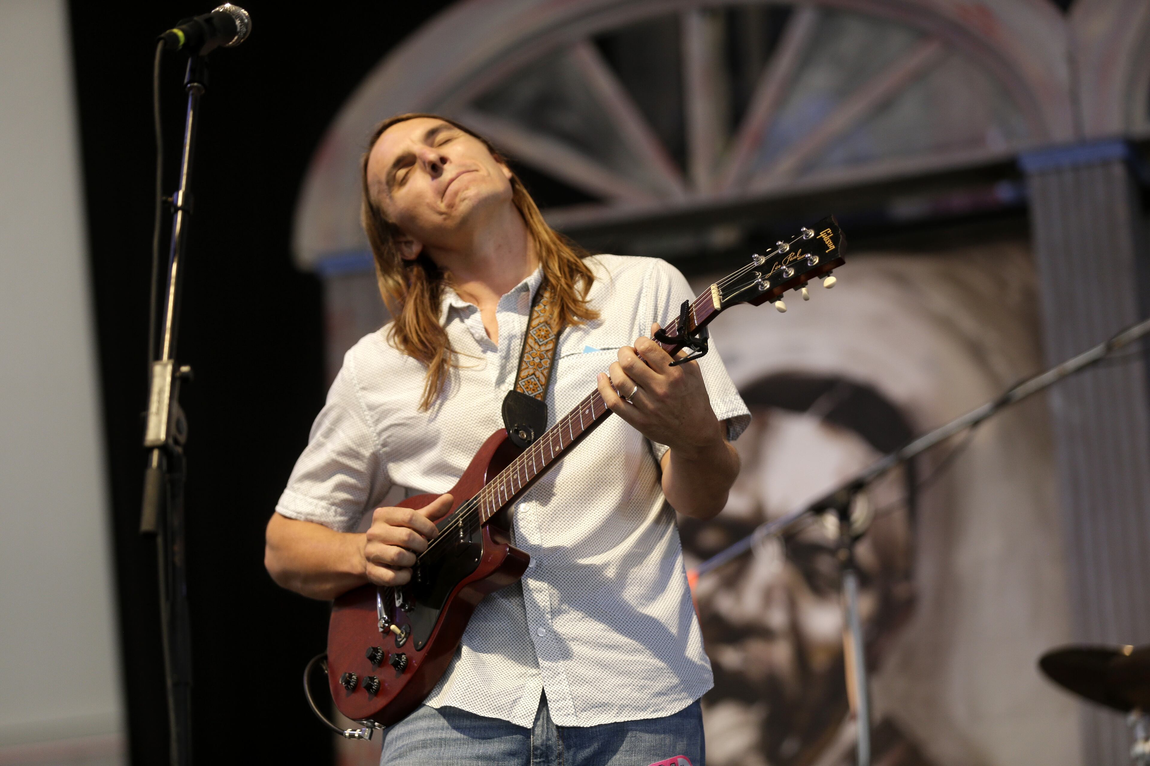 Blues guitarist and singer Colin Lake performs at the New Orleans Jazz and Heritage Festival in New Orleans, Friday, May 1, 2015. (AP Photo/Gerald Herbert)