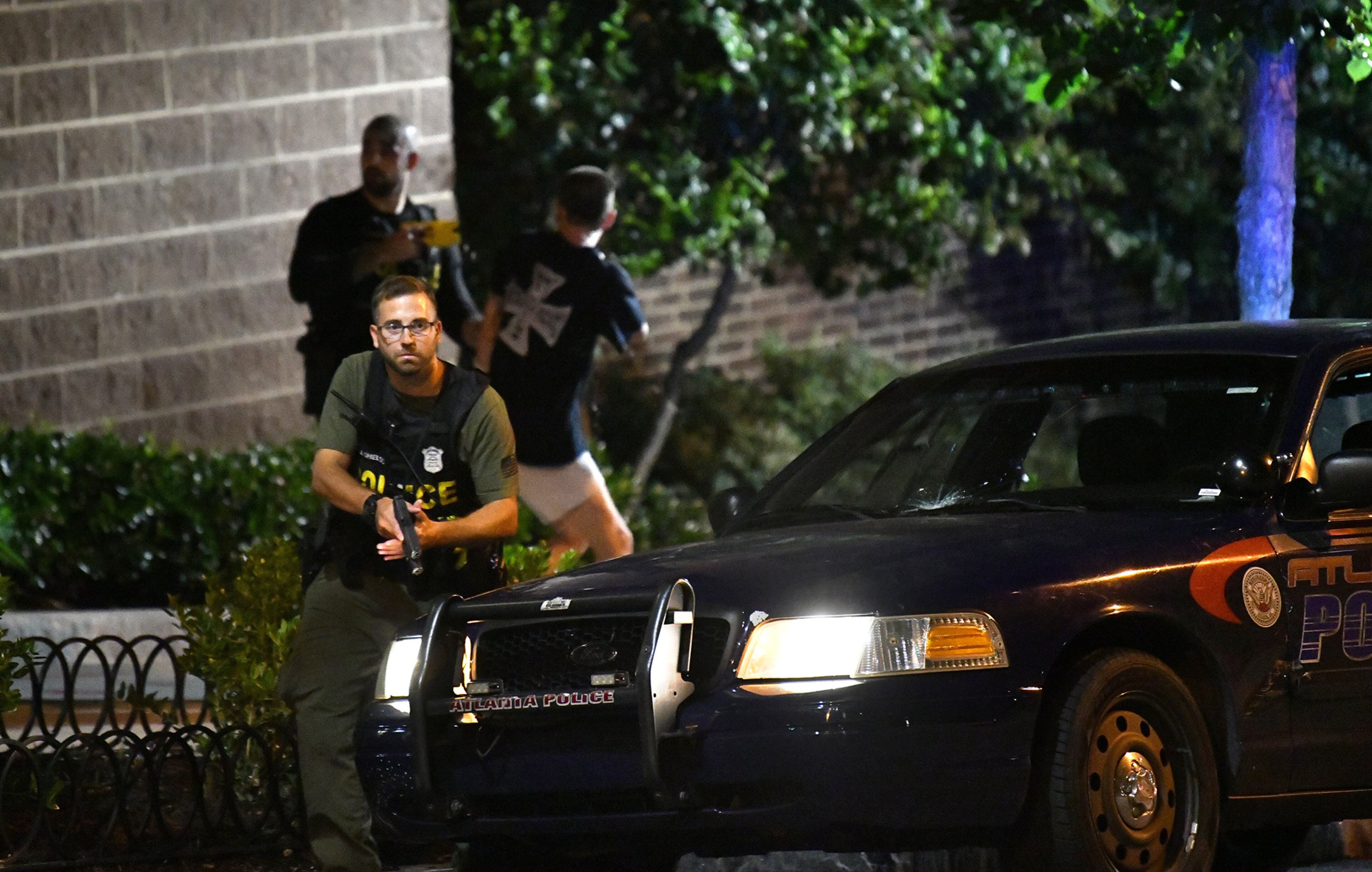 May 30, 2020 Atlanta - Police arrested a protestor after curfew Saturday, some vandalizing property, as protests began for a second day in downtown Atlanta on Saturday, May 30, 2020. A second day of protests Saturday began with a crowd outside the Governor's Mansion and grew to include demonstrations in downtown Atlanta. Mayor Keisha Lance Bottoms implemented a curfew for the city following a night of chaotic protests Friday that led to vandalism and looting in parts of downtown Atlanta and Buckhead. (Hyosub Shin / Hyosub.Shin@ajc.com)