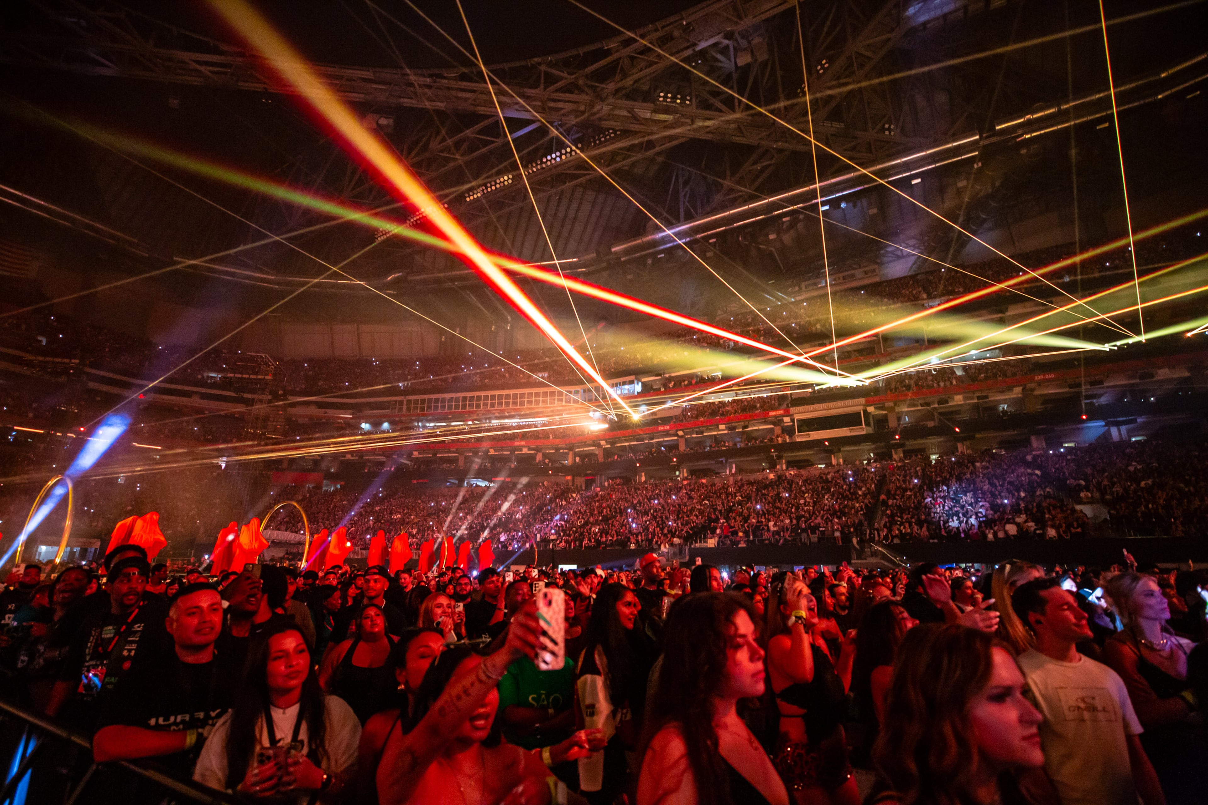 The Weeknd electrifies the Atlanta crowd at Mercedes-Benz Stadium on Thursday, Aug. 21, 2025, bringing Playboi Carti and Future along for the ride. (Ryan Fleisher for the AJC)