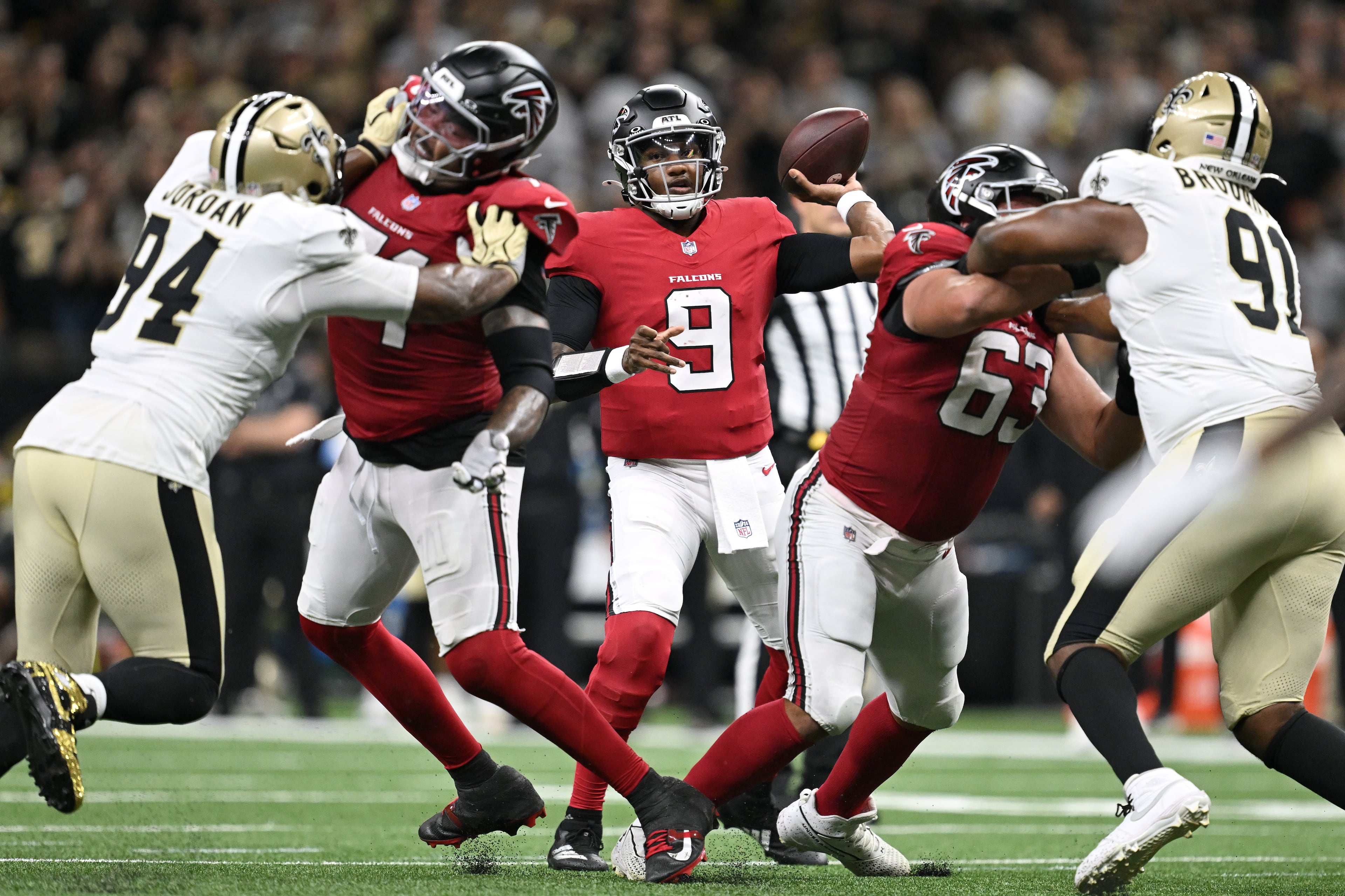 Atlanta Falcons quarterback Michael Penix Jr. (center) passes against the New Orleans Saints during the first half of an NFL football game in New Orleans, Monday, Oct. 5, 2026. (Ella Hall/AP)