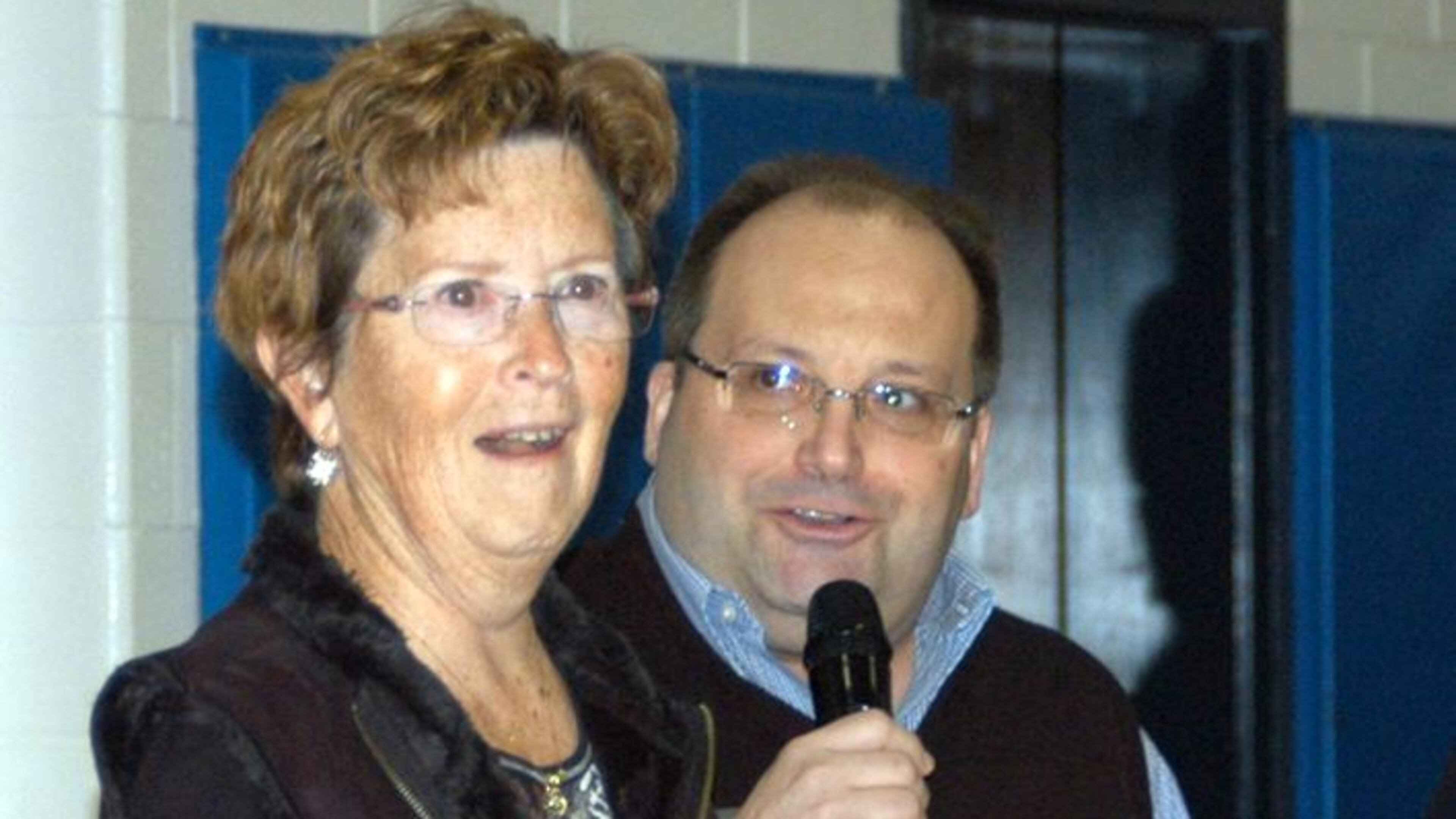 Sandy Golden is shocked to learn that she is the Kemp’s Dalton West Flooring community award winner for December. Representatives from the business surprised her during a special presentation at Robert J. Burch Elementary.