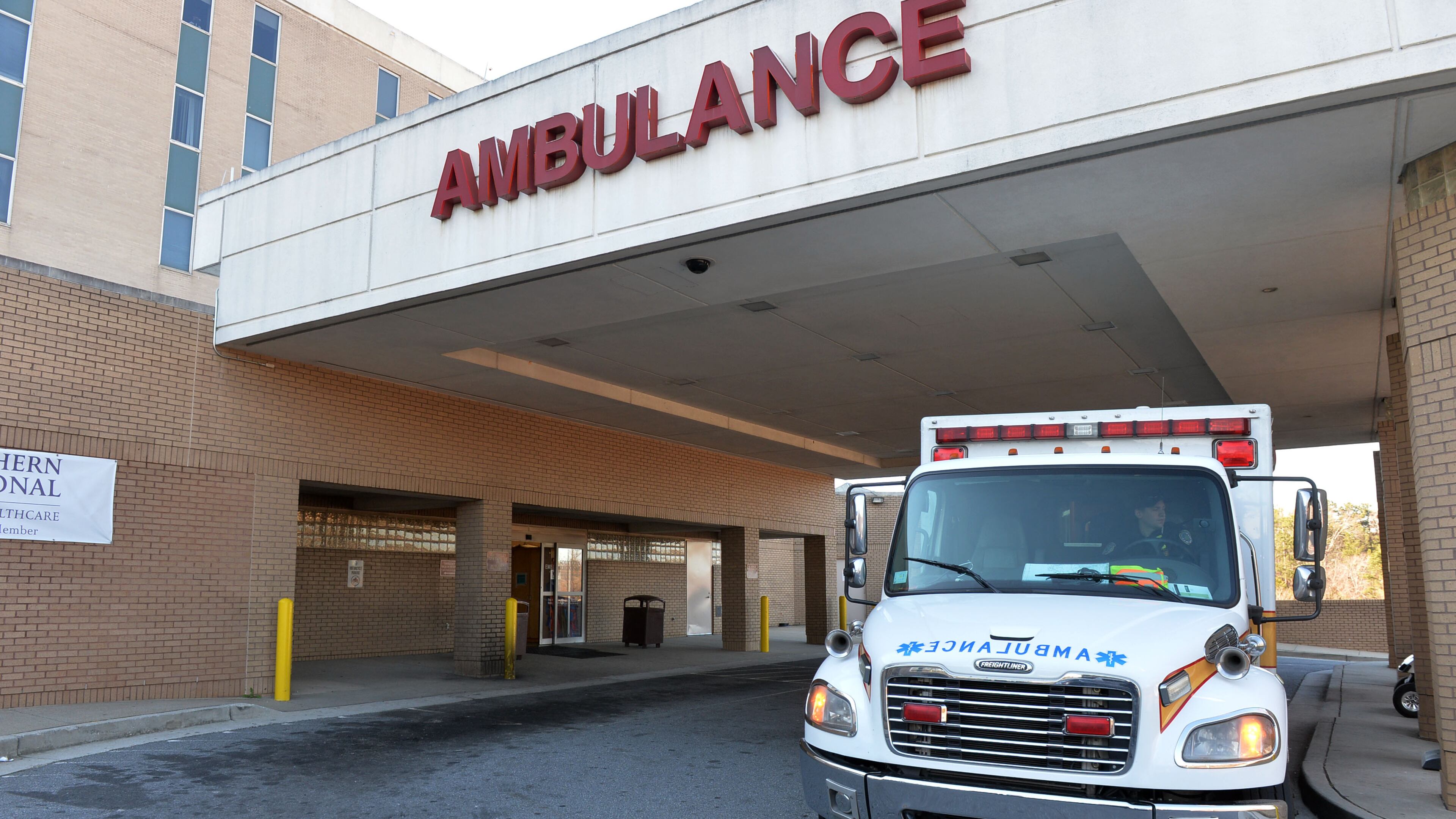 Clayton County ambulances line up in the driveway outside the emergency room of the Southern Regional Medical Center in Riverdale, Friday, January 30, 2015. KENT D. JOHNSON/ KDJOHNSON@AJC.COM