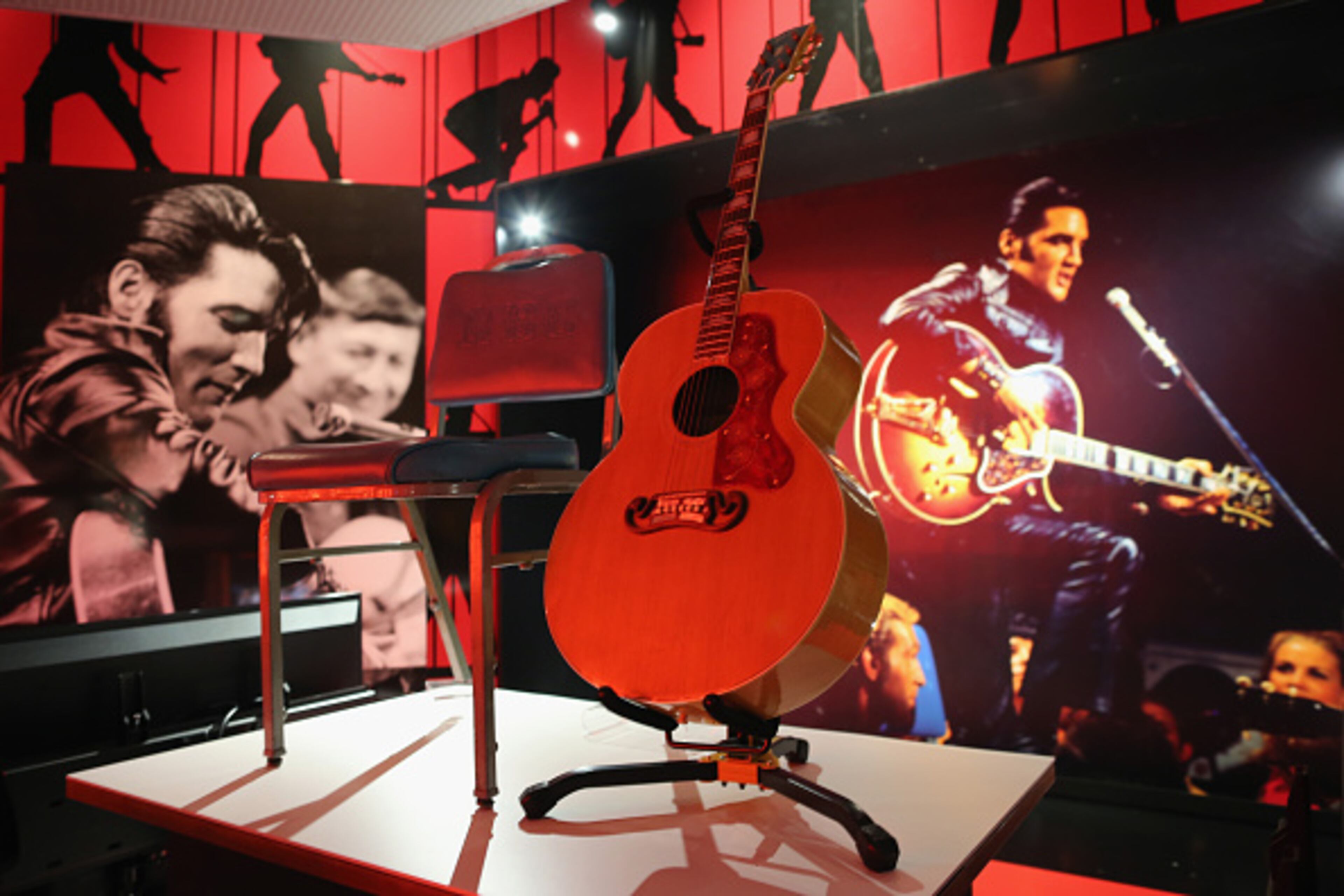 LONDON, ENGLAND - DECEMBER 11: A Gibson J200 from the 1968 TV special is displayed during a press call at the 'Elvis at the O2, The Exhibition of His Life' on December 11, 2014 in London, England. The exhibition is the largest ever retrospective ever to take place in Europe, and features over 300 artefacts from the Presley family's Graceland Archives. The show runs at the O2 Arena from 12 December to 31 August, 2015. (Photo by Dan Kitwood/Getty Images)