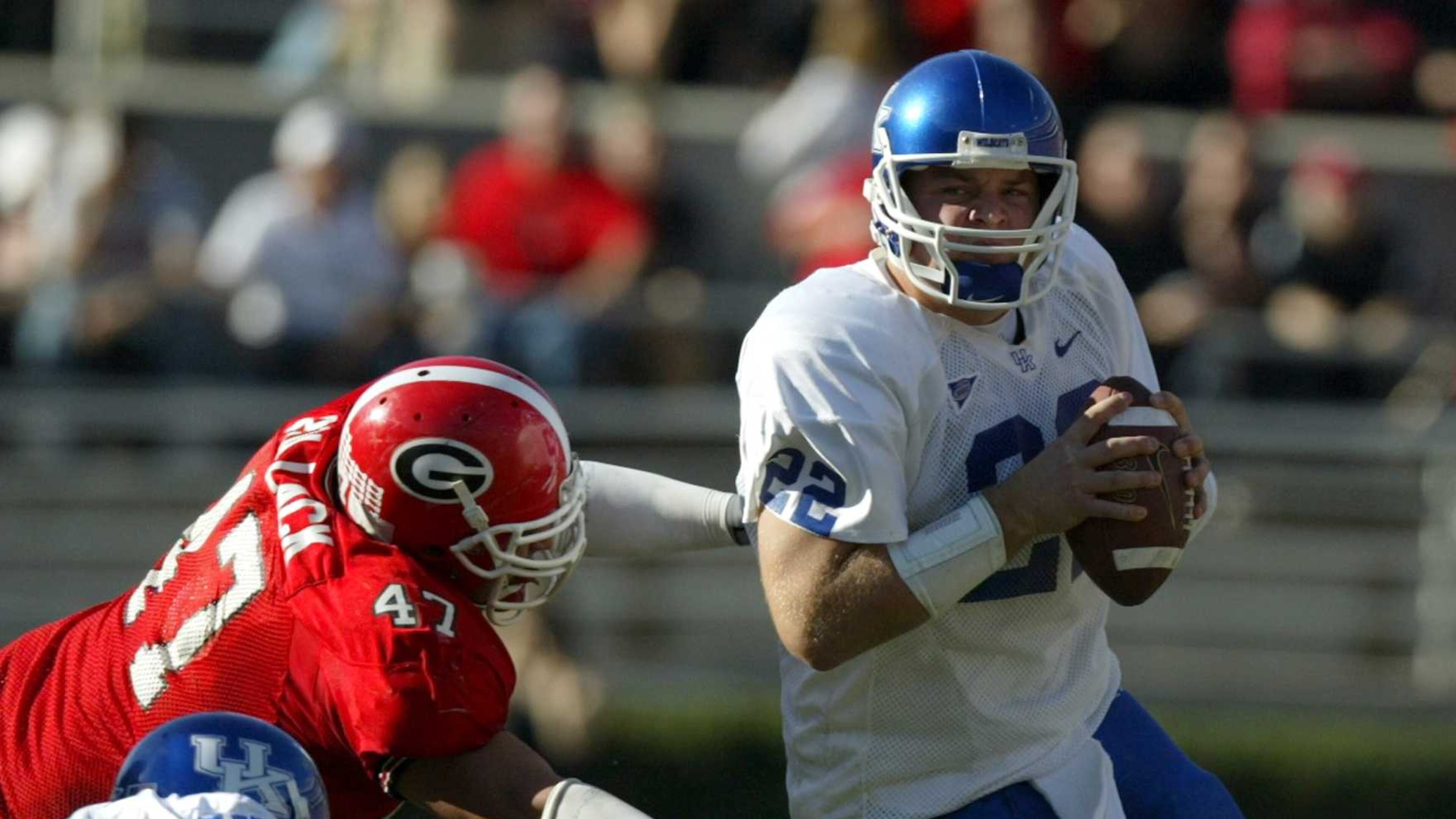 Jared Lorenzen (right) tries to elude Georgia's David Pollack.