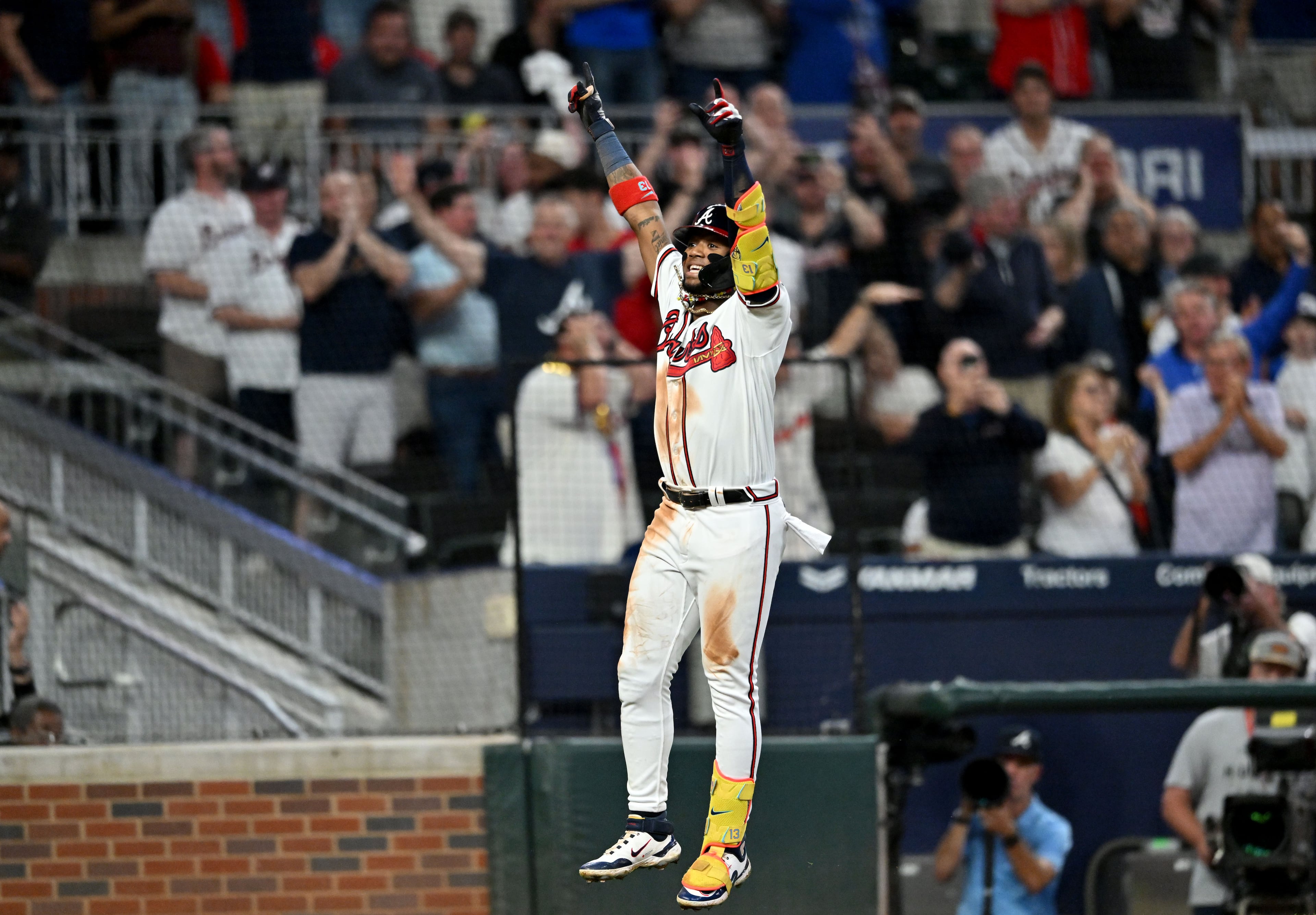 Atlanta Braves' right fielder Ronald Acuna Jr. (13) celebrates after hitting a solo home run during the sixth inning at Truist Park, Tuesday, September 19, 2023, in Atlanta. Atlanta Braves won 9-3 over Philadelphia Phillies. (Hyosub Shin / Hyosub.Shin@ajc.com)