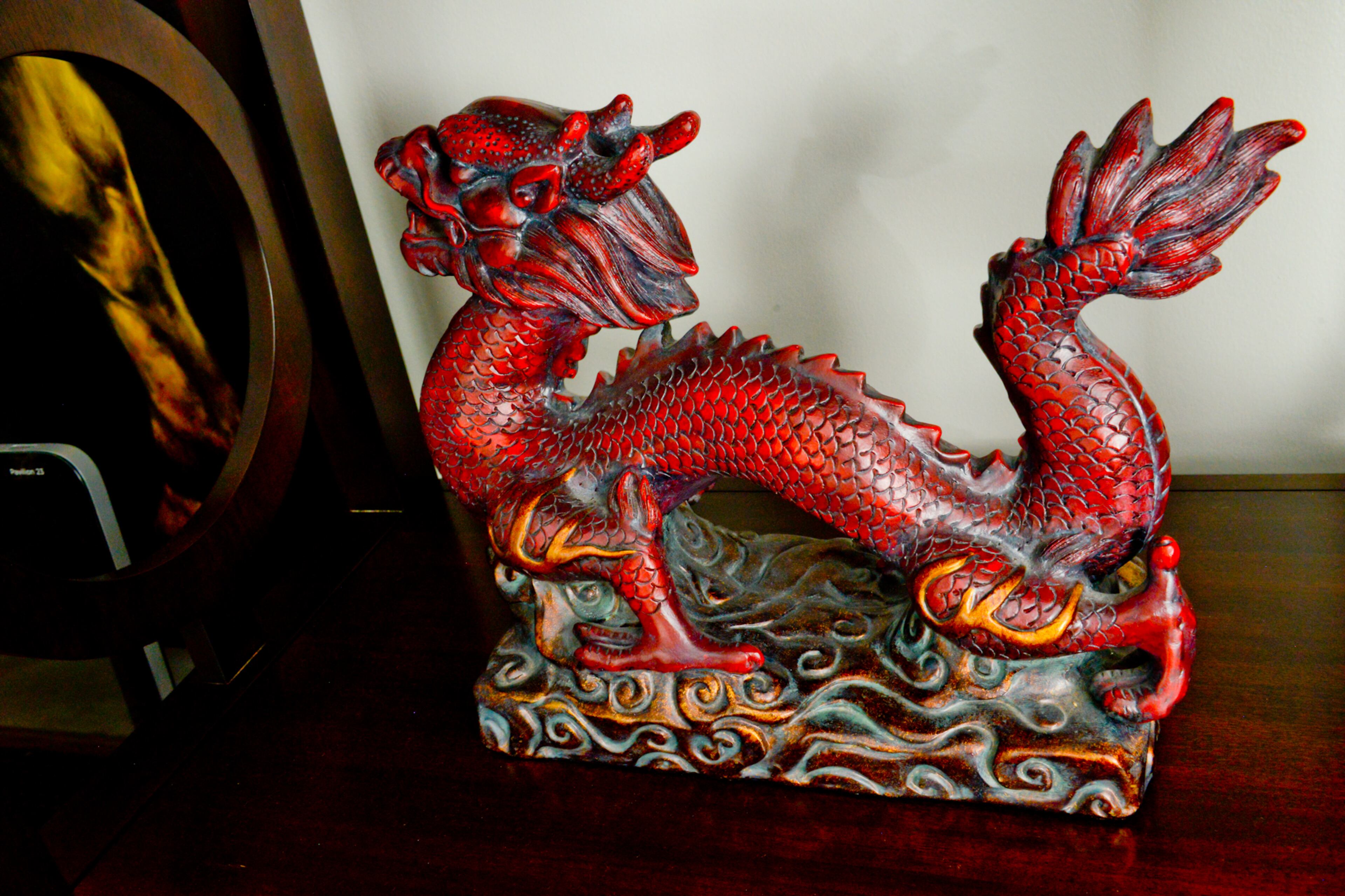 In keeping with the modern Asian accents in the home, Jeffrey Taylor Johnson's home office features a red Chinese dragon statue he found at AmericasMart.