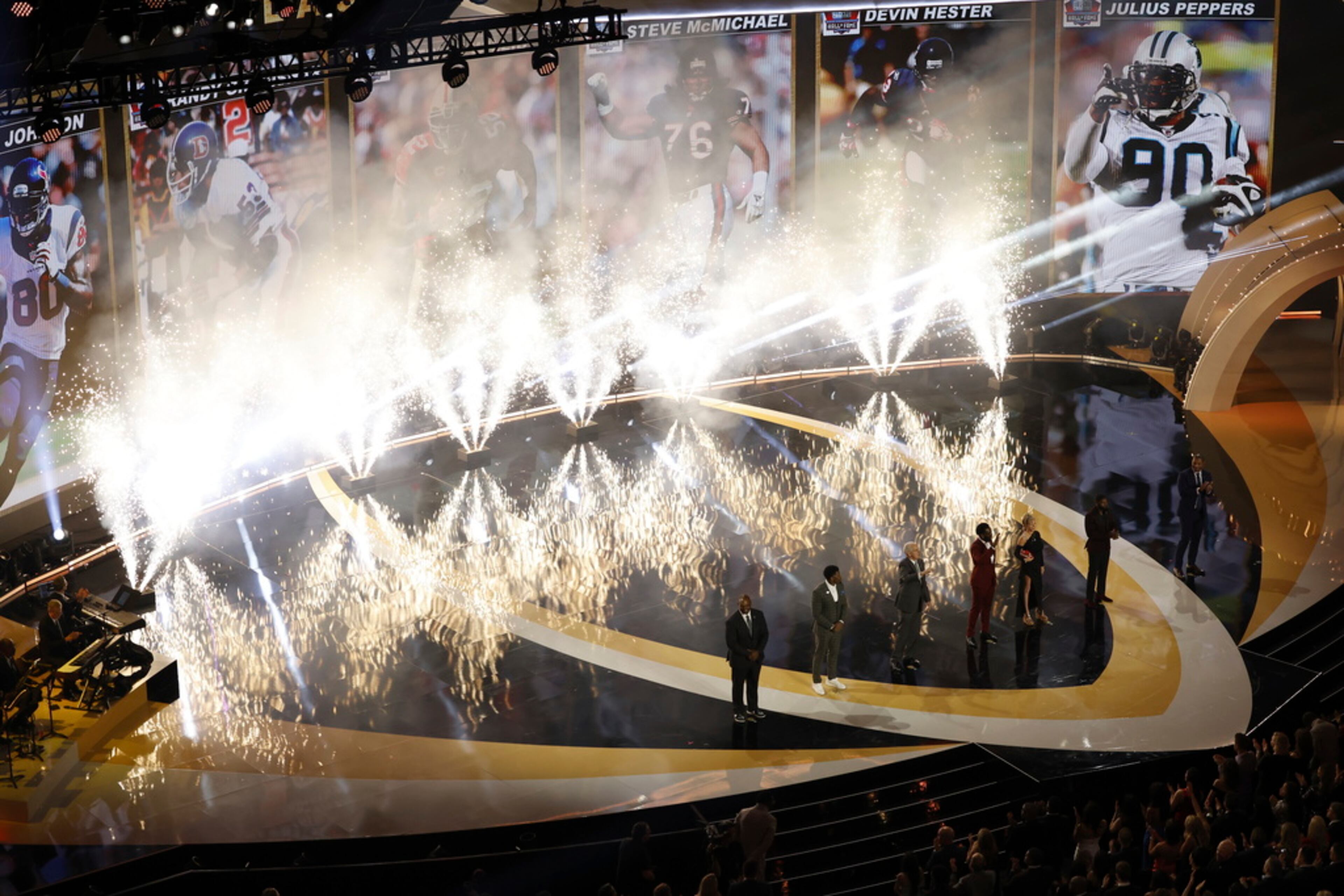 The Hall of Fame class of 2024 appears onstage during the NFL Honors award show ahead of the Super Bowl 58 football game, Thursday, Feb. 8, 2024, in Las Vegas. (AP Photo/Tyler Kaufman)