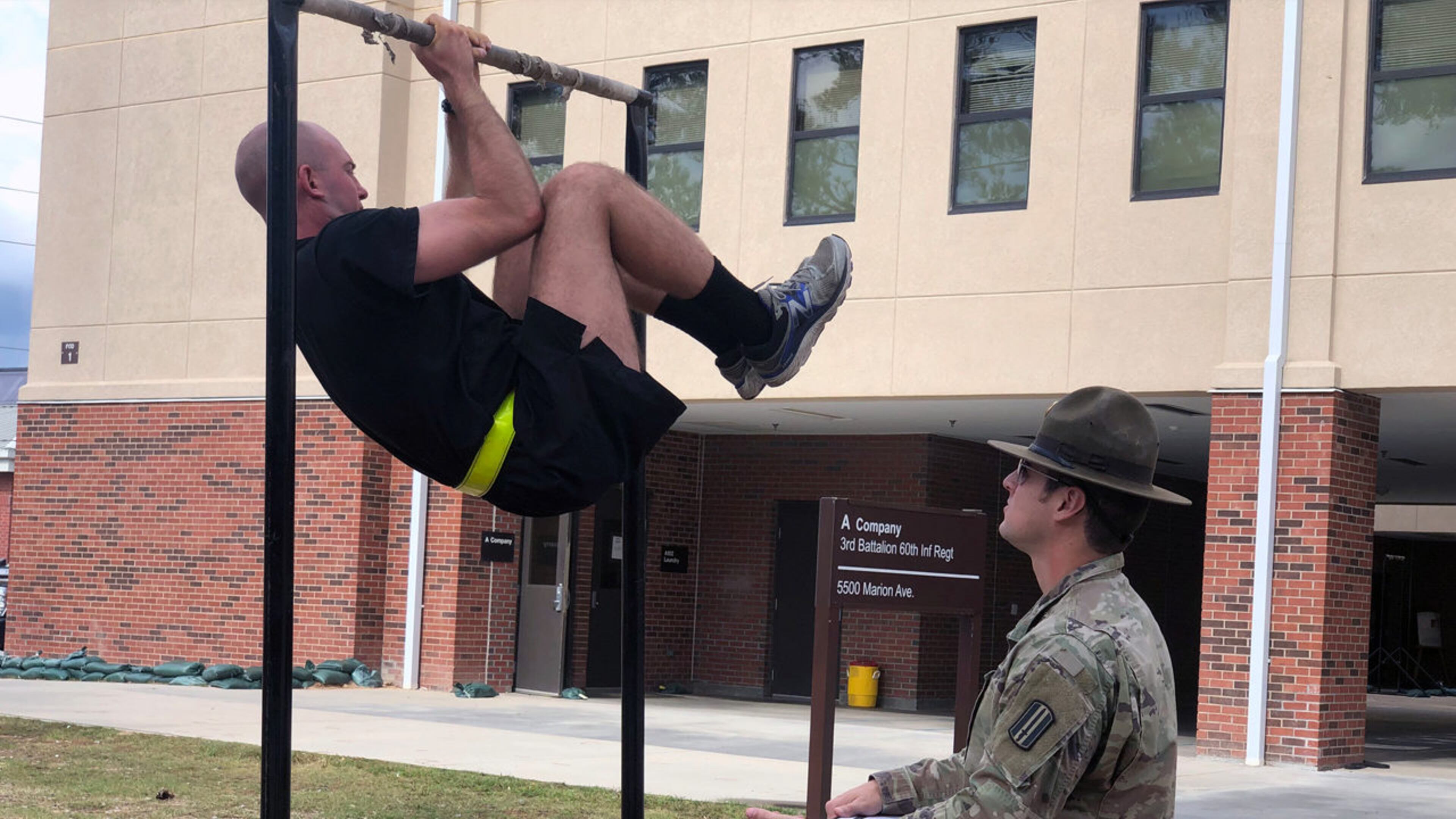 Sgt. 1st Class Raymond Cabrera with Company A, 3rd Battalion, 60th Infantry Regiment, observes Spc. Benjamin Ritchie conduct an Army Combat Fitness Test event. Ritchie became the third Soldier to max the ACFT during a test Oct. 21.