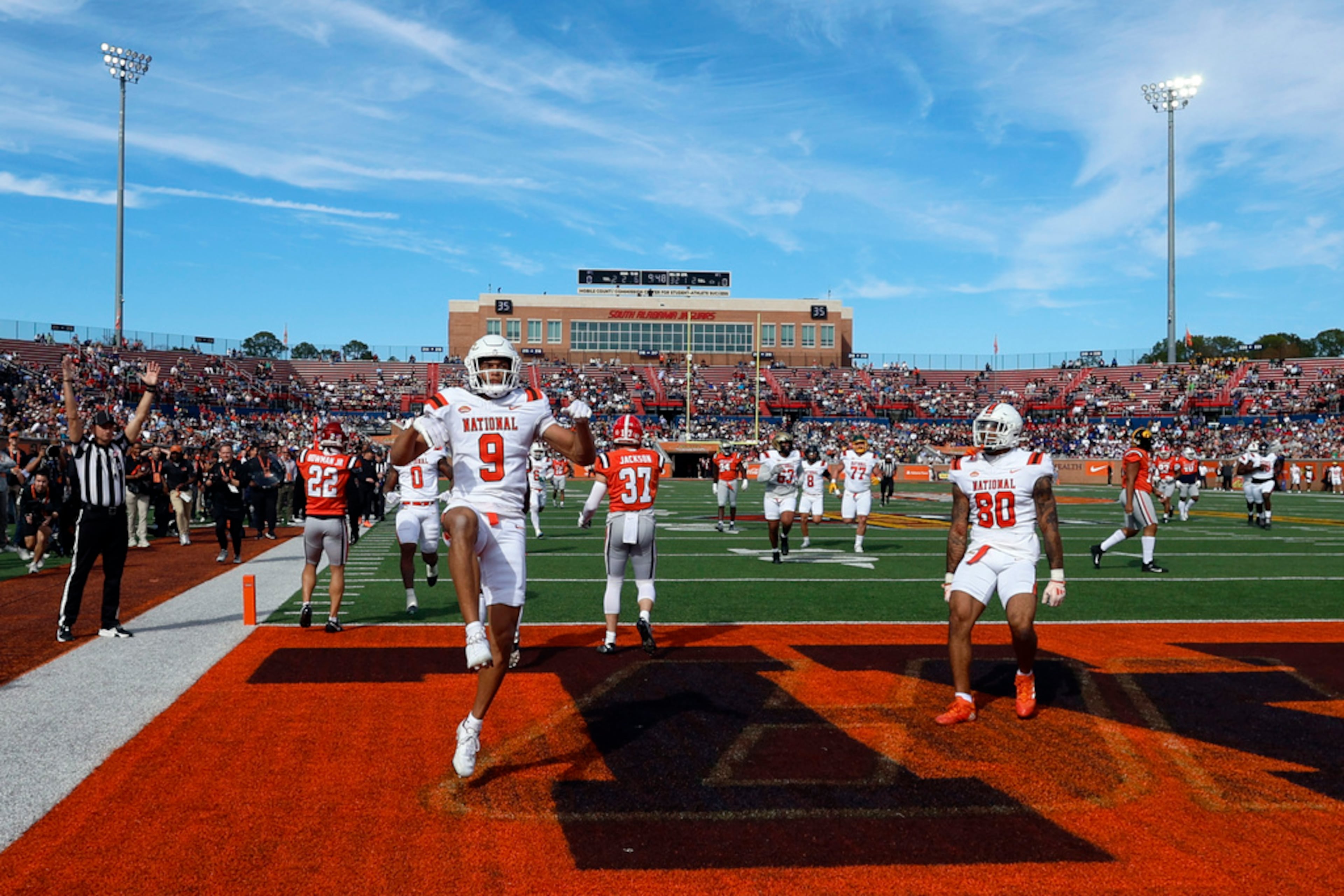 National team wide receiver Jayden Higgins (9), of Iowa State,reacts after scoring a touchdown against the American team during the first half of the Senior Bowl NCAA college football game, Saturday, Feb. 1, 2025, in Mobile, Ala. (AP Photo/Butch Dill)