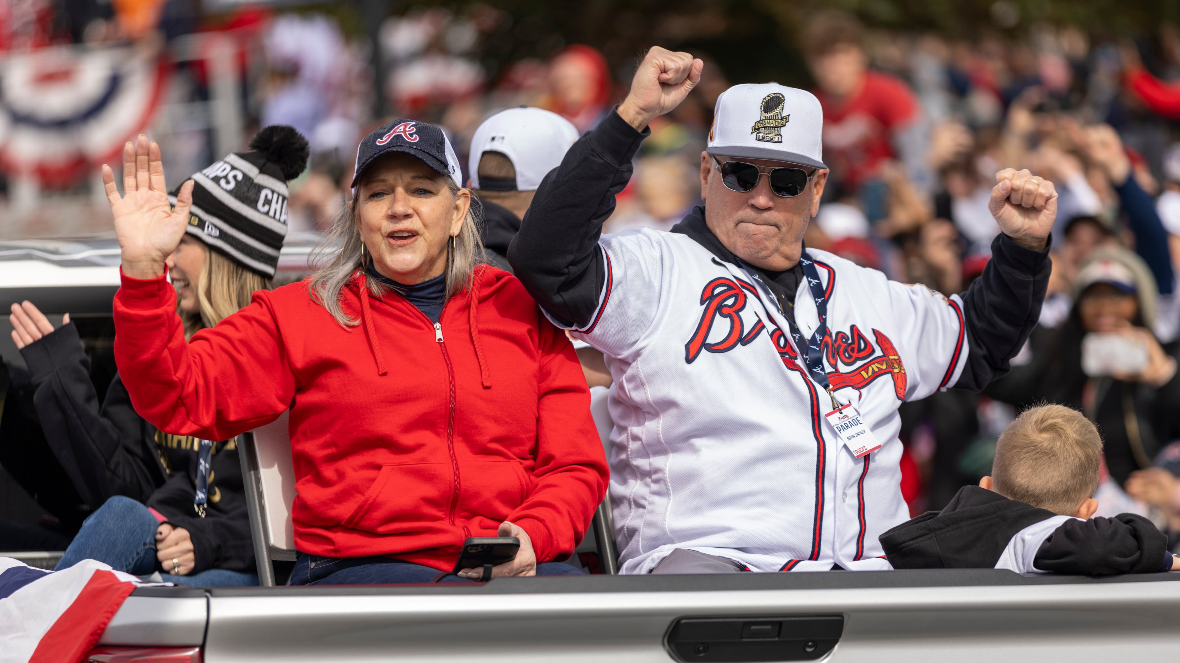 Braves manager Brian Snitker celebrates during the Braves' victory parade in Cobb County, Georgia on November 5th, 2021.
