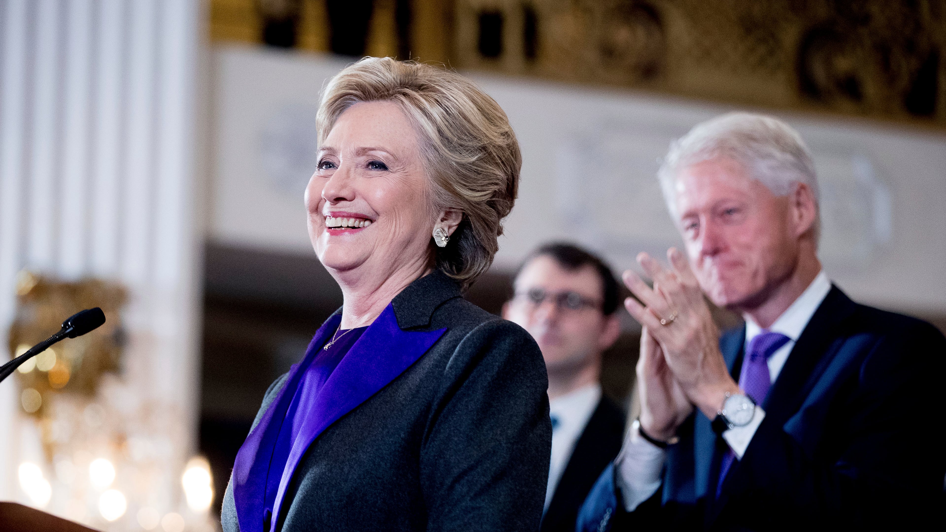 Hillary Clinton, accompanied by former President Bill Clinton, right, pauses while speaking to staff and supporters at the New Yorker Hotel in New York, Wednesday, Nov. 9, 2016, where she conceded her defeat to Republican Donald Trump after the hard-fought presidential election. (AP Photo/Andrew Harnik)