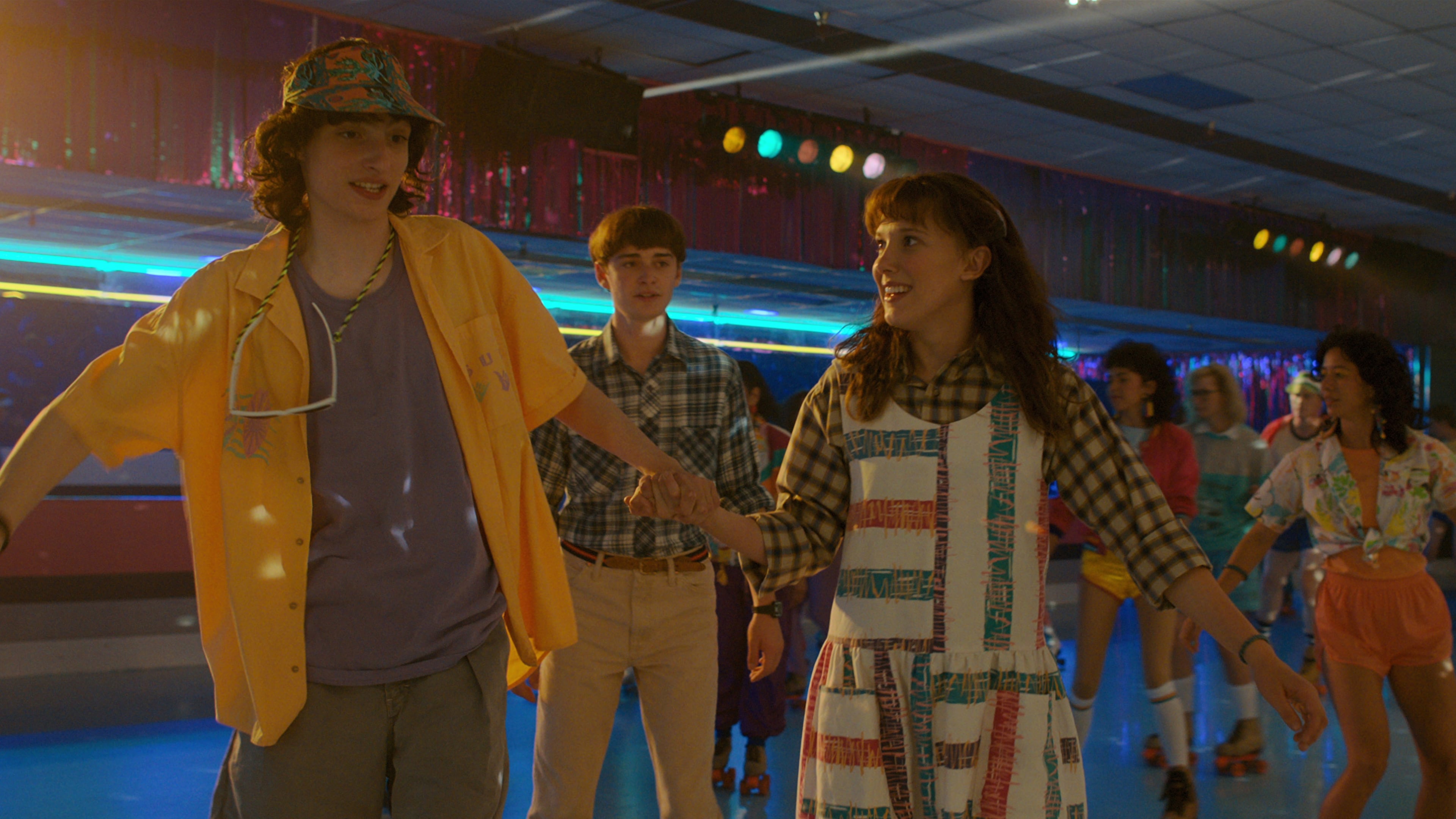 (L to R) Finn Wolfhard as Mike Wheeler, Noah Schnapp as Will Byers and Millie Bobby Brown as Eleven in STRANGER THINGS. Cr. Courtesy of Netflix © 2022