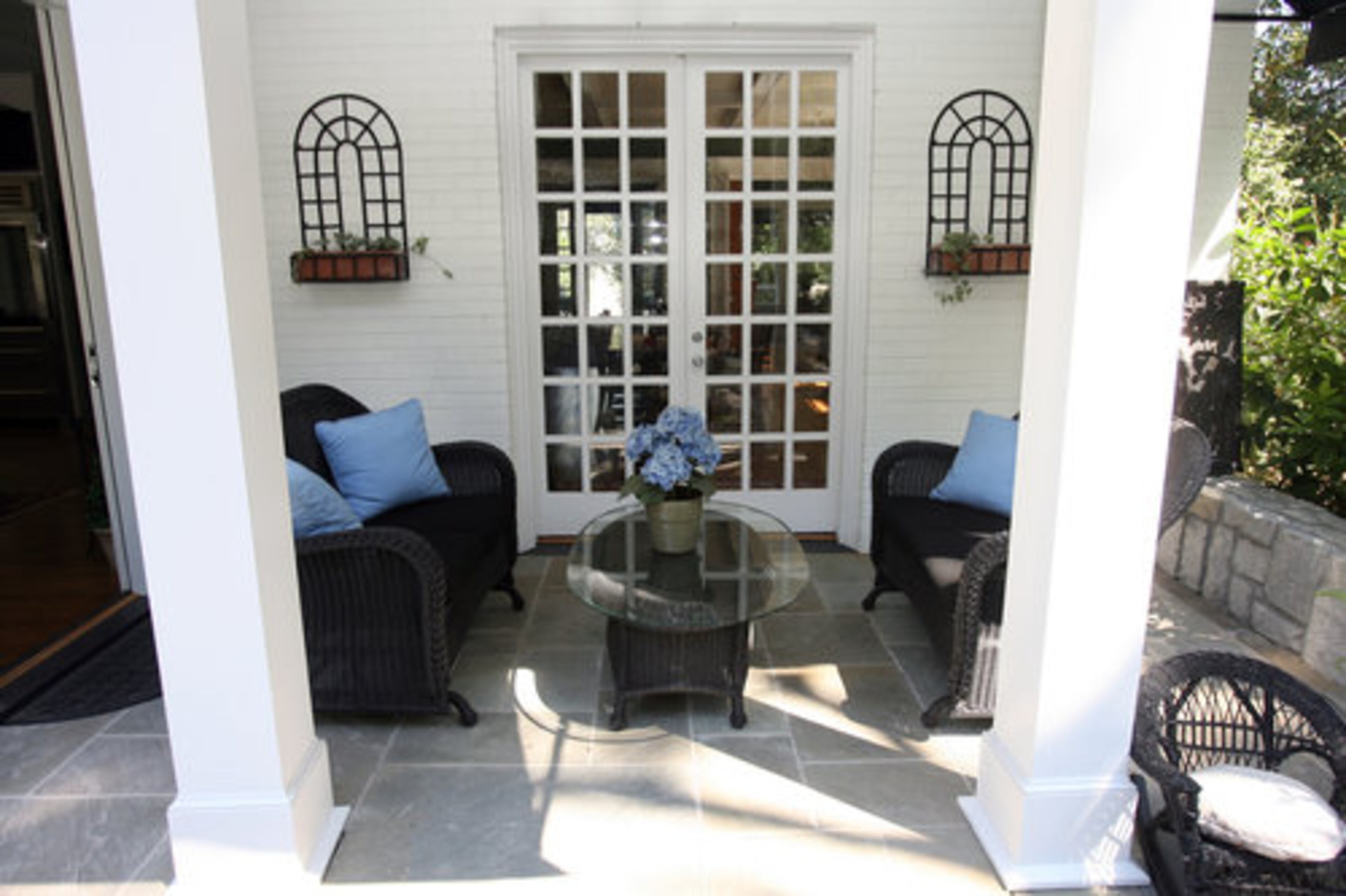 The backyard of Susan Gibbs' home features a large sitting area.