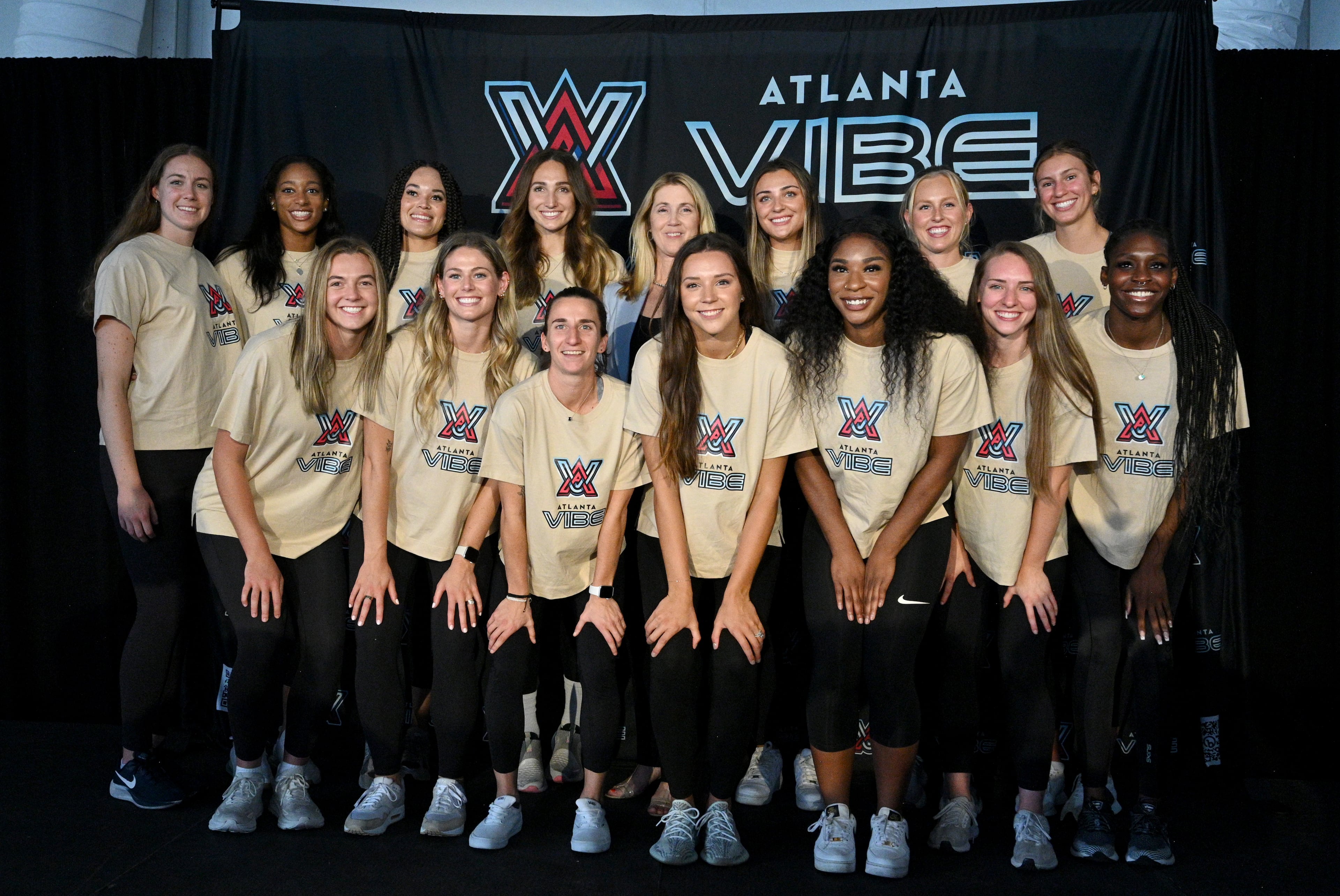 Members of Atlanta Vibe, Atlanta's new pro volleyball team, pose for a group photo during a team announcement event Friday. The Atlanta team formally announced its name, colors, and logo during the AVP’s (Association of Volleyball Professionals) Beach Volleyball Gold Series Atlanta Open, held at Atlantic Station in midtown Atlanta. The Atlanta Pro Volleyball Federation team has selected Gas South Arena as its home venue when it opens its inaugural season in early 2024. (Hyosub Shin / Hyosub.Shin@ajc.com)