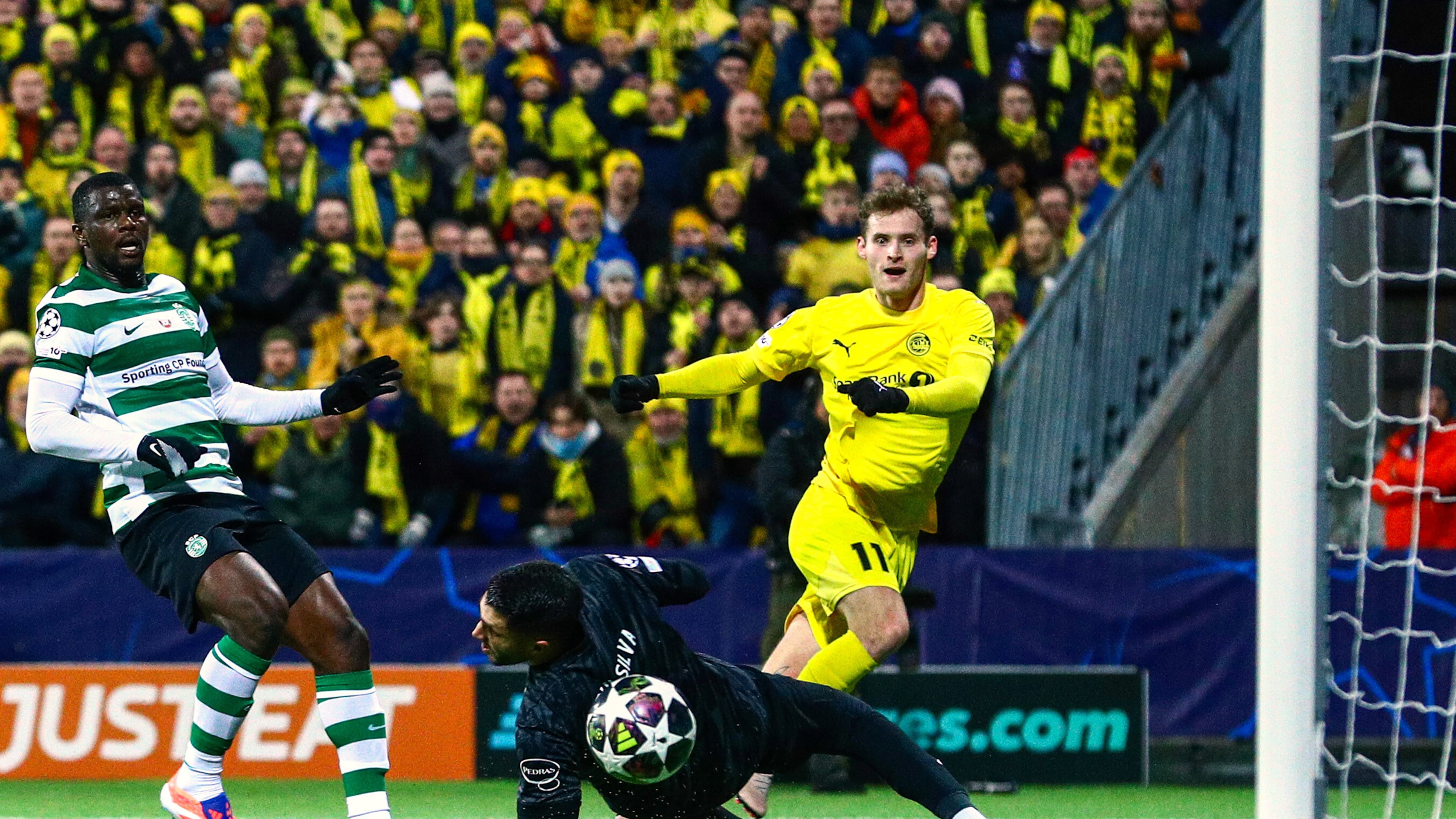 Bodo/Glimt's Ole Didrik Blomberg, right, scores their side's second goal of the game during the Champions League soccer match between Bodo/Glimt and Sporting Lisbon, in Bodo, Norway, Wednesday March 11, 2026. (Fredrik Varfjell/NTB Scanpix via AP)