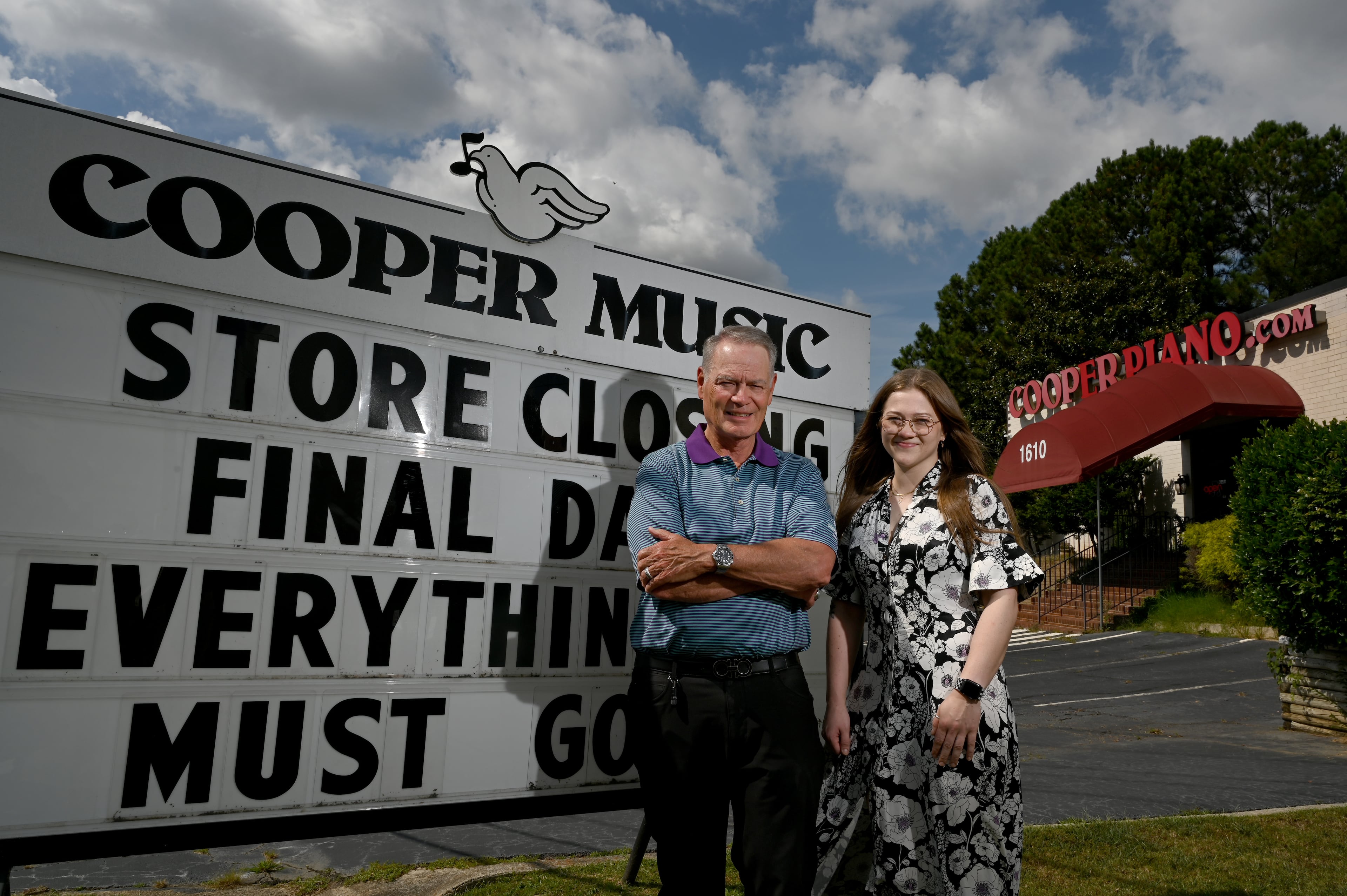 Blake Cooper and Laura Cooper are preparing for the store to close. (Hyosub Shin/AJC)