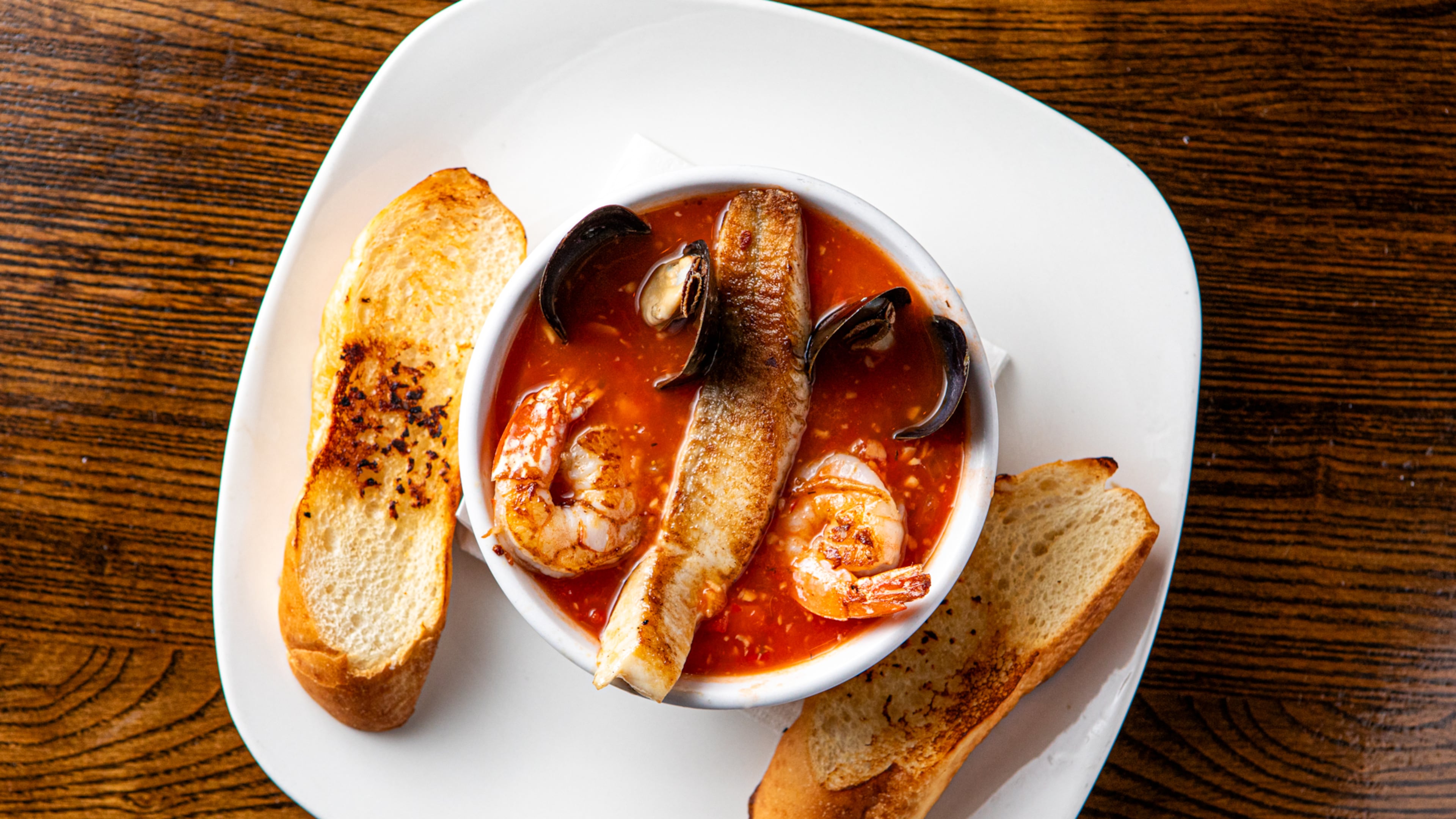 Hook Line & Schooner's Manhattan Seafood Chowder “makes for a unique and satisfying dining experience every time,” says general manager Phillip Morgan. (Aaliyah Man for the AJC)