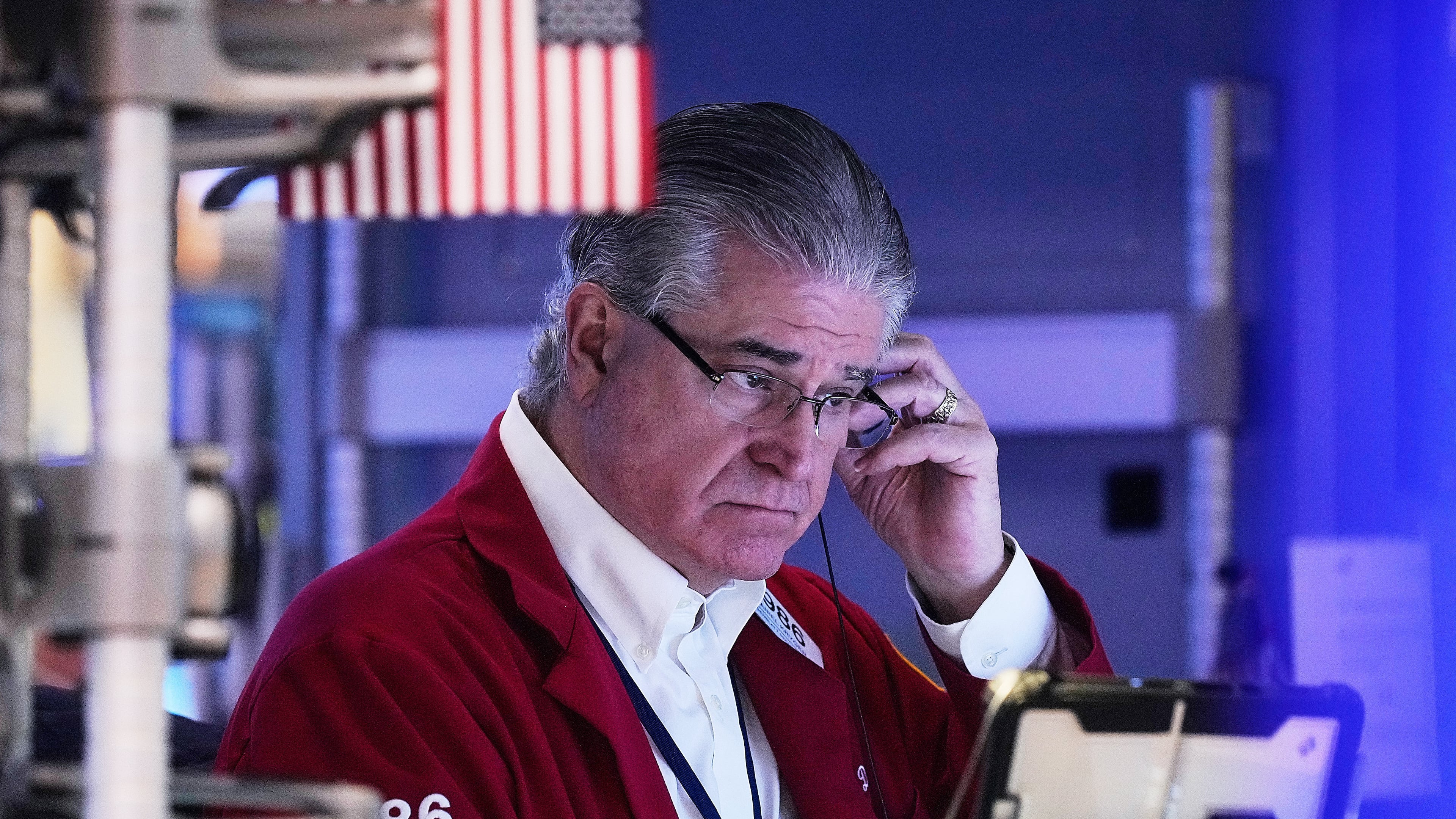 FILE - Trader Daniel Kryger works on the floor of the New York Stock Exchange, Monday, Feb. 2, 2026. (AP Photo/Richard Drew, File)