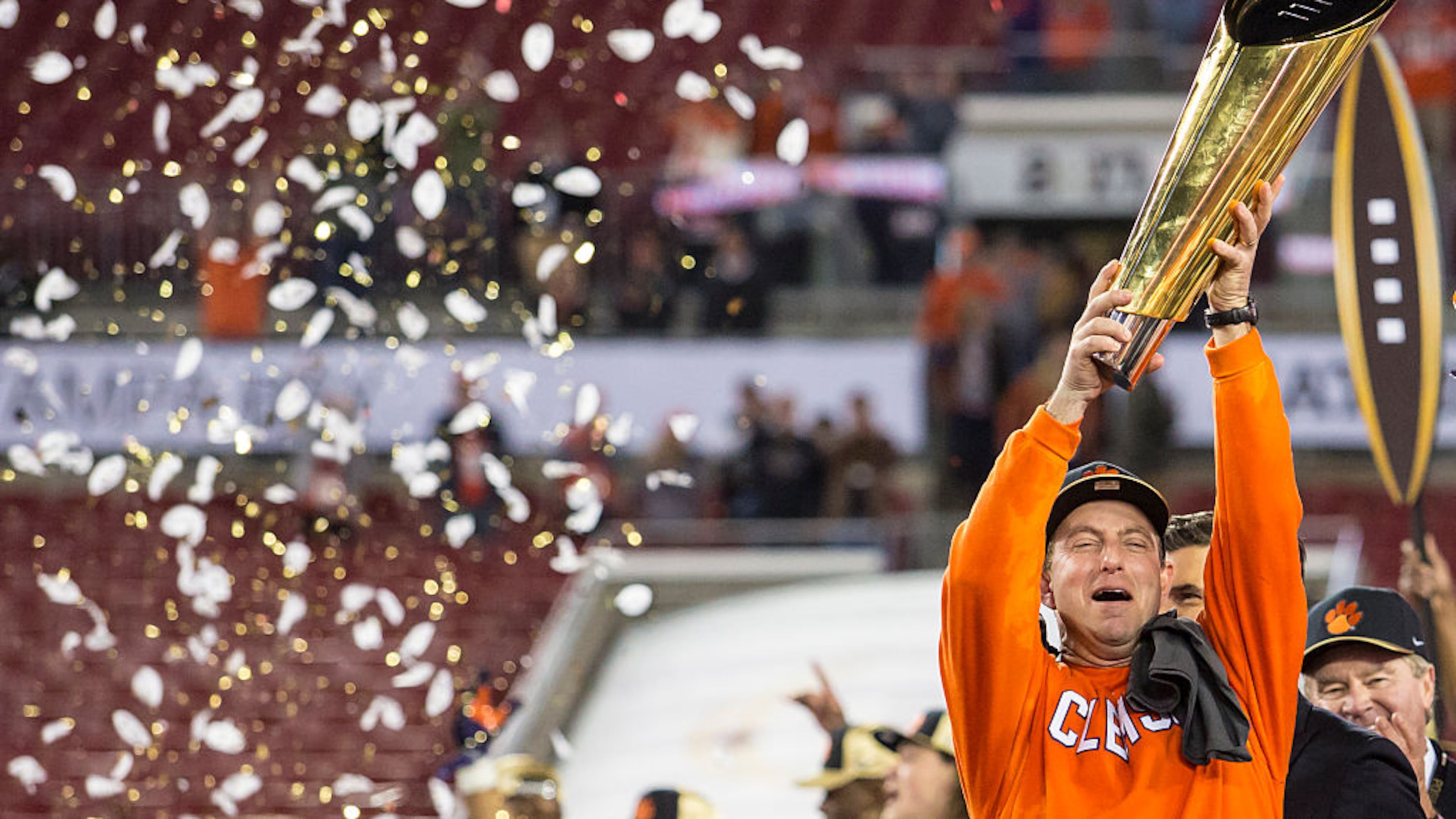 Clemson coach Dabo Swinney hoisted the national championship trophy when the Tigers defeated Alabama in Tampa, Fla. Will Swinney hold the title airborne again on Jan. 8 in Atlanta?