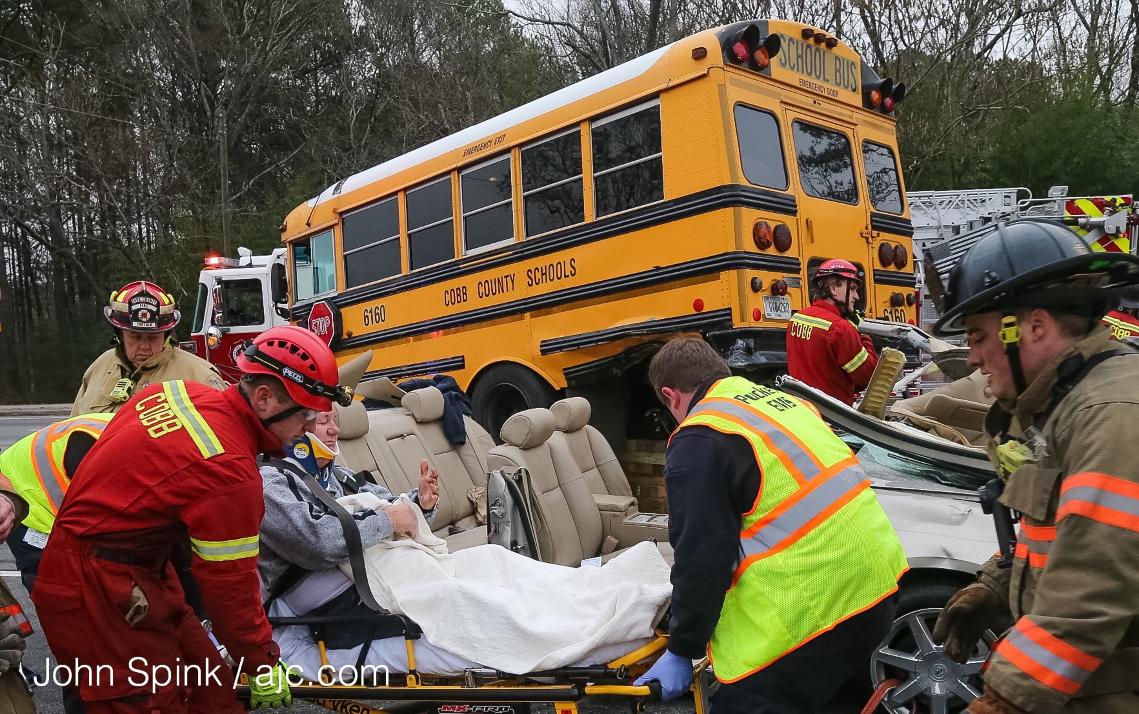 A driver was injured in a school bus crash Tuesday on Austell Road in Cobb County.