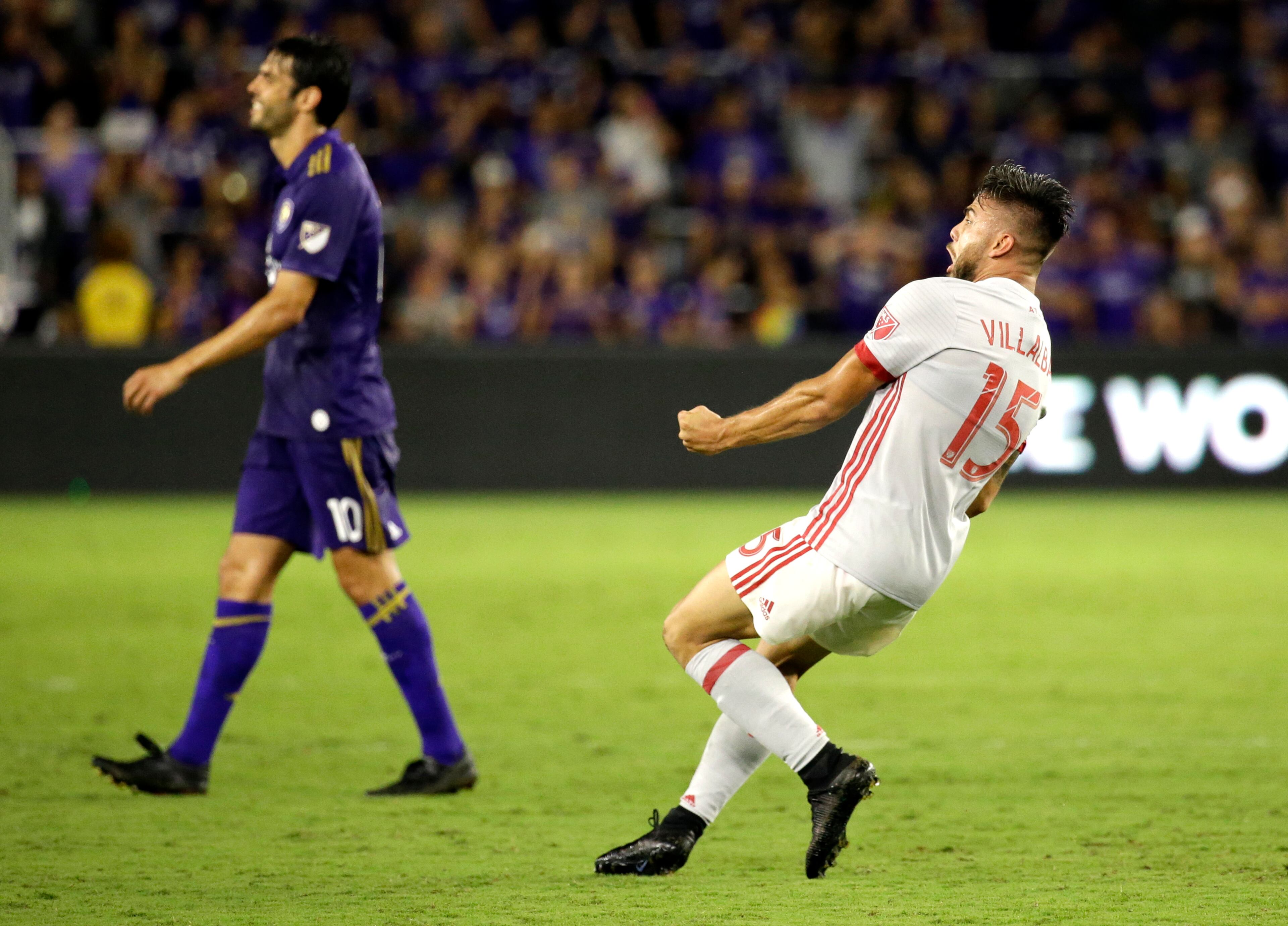 Atlanta United's Hector Villalba, right, celebrates in front of Orlando City's Kaka after scoring a goal in the second half of an MLS soccer match, Friday, July 21, 2017, in Orlando, Fla. Atlanta United won 1-0. (AP Photo/John Raoux)