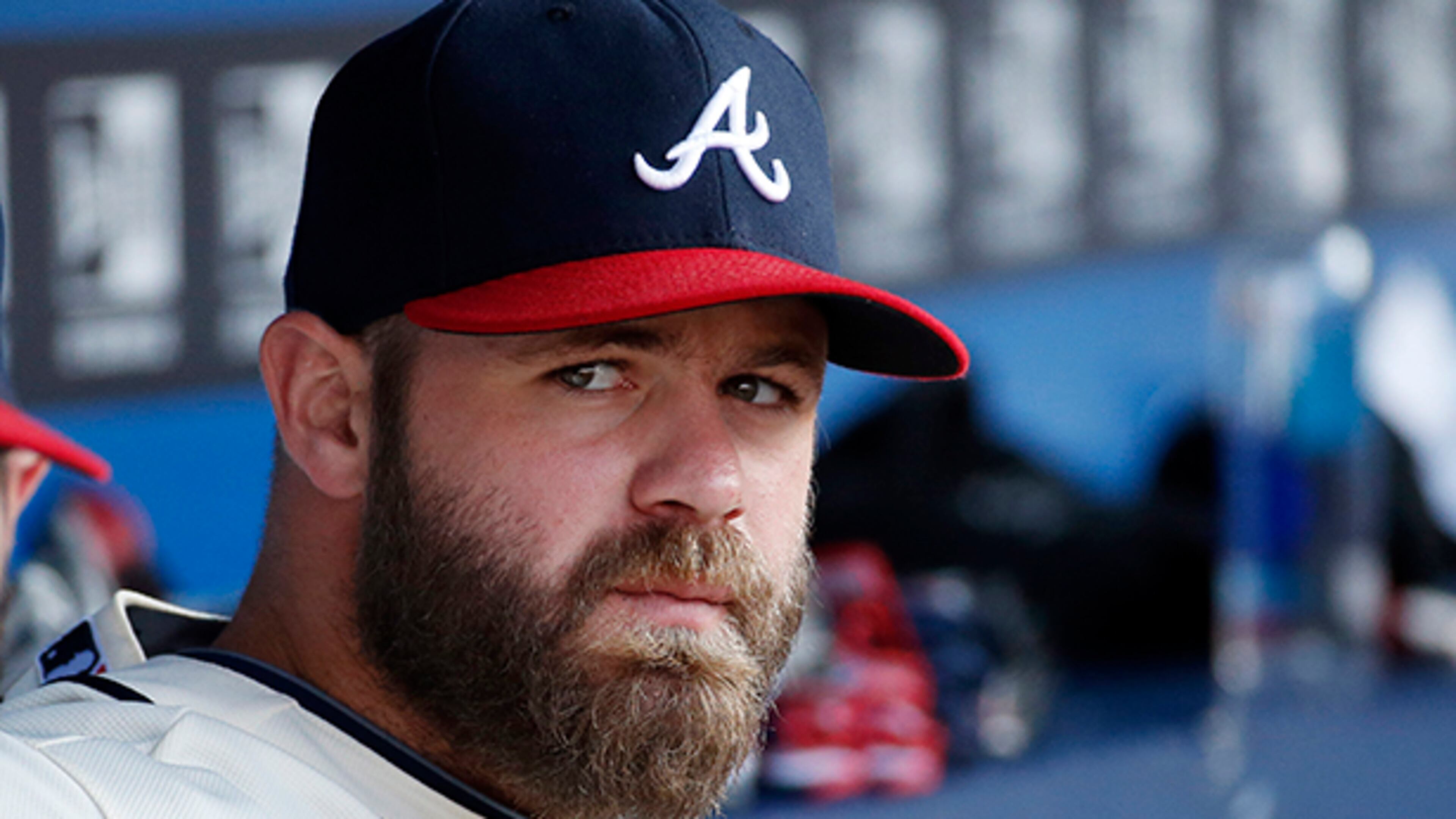 Atlanta Braves catcher Evan Gattis has been on the bench since June 27 with a bulging disc in his upper back.