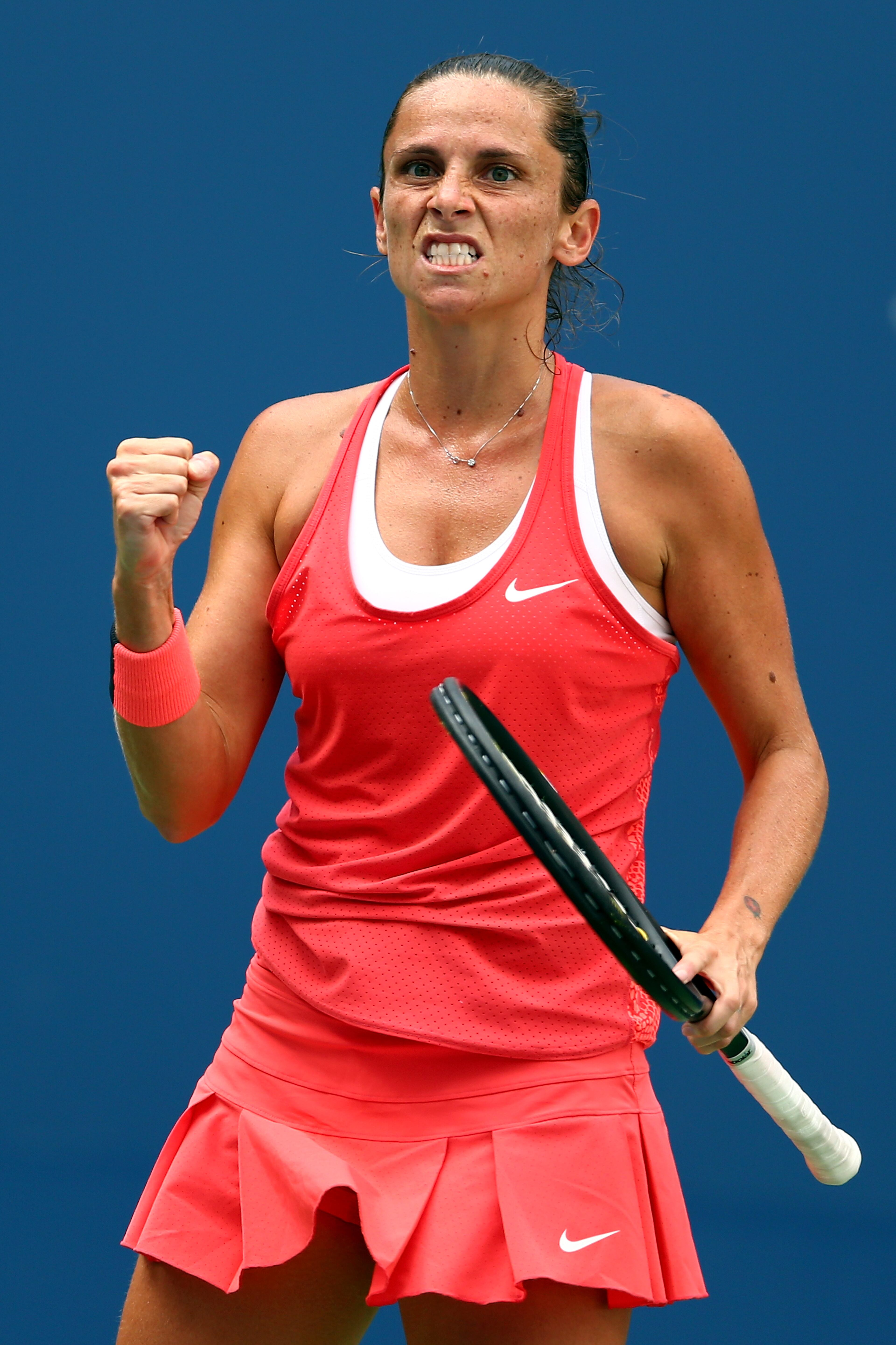 Roberta Vinci of Italy celebrates a point in the third set against Serena Williams of the United States during their Women's Singles Semifinals match on Day Twelve of the 2015 US Open at the USTA Billie Jean King National Tennis Center on September 11, 2015 in the Flushing neighborhood of the Queens borough of New York City. (Photo by Clive Brunskill/Getty Images)