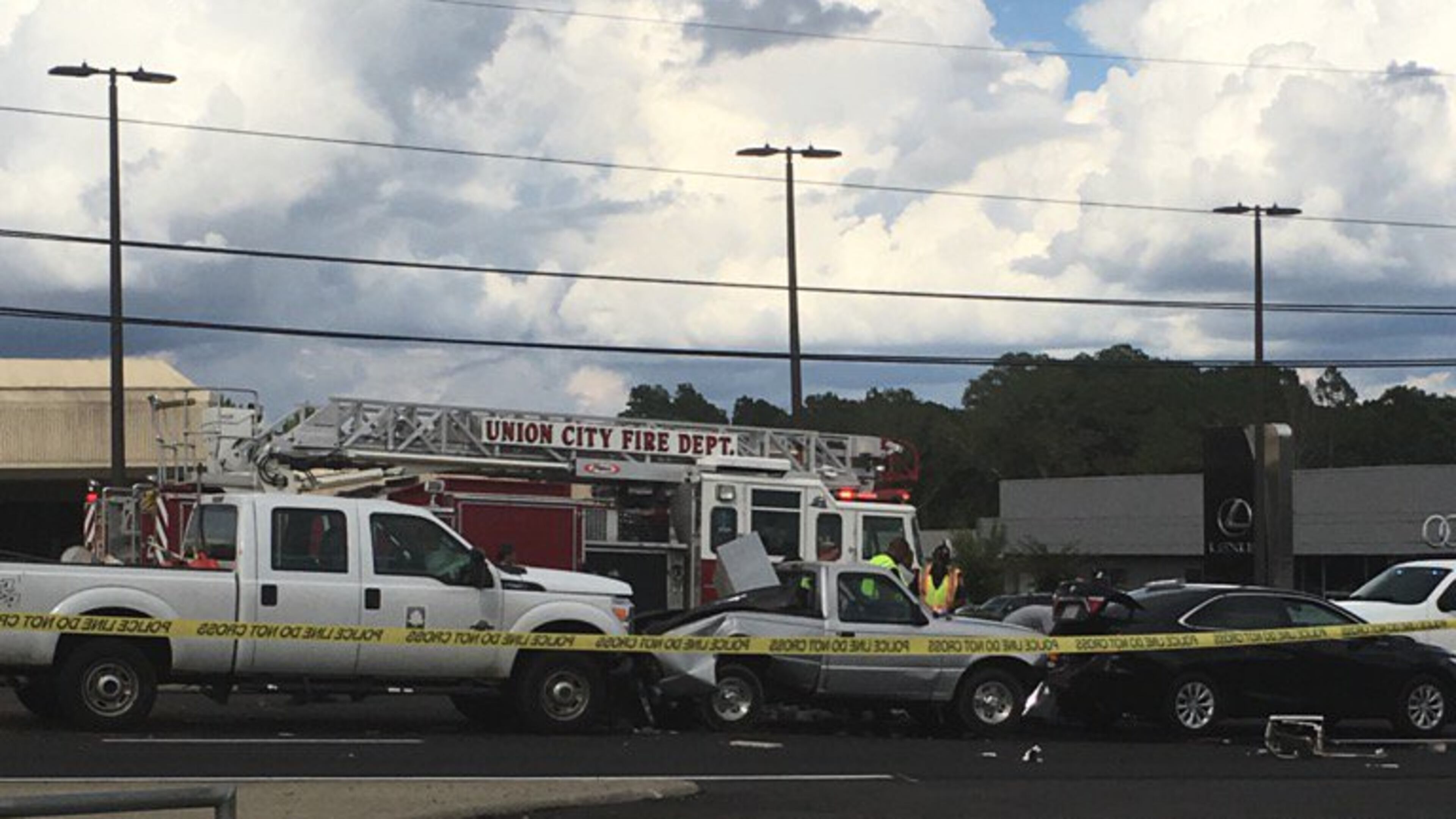 A Fulton County employee struck and killed two people who were out of their cars surveying damage from a fender-bender. (Credit: Channel 2 Action News)