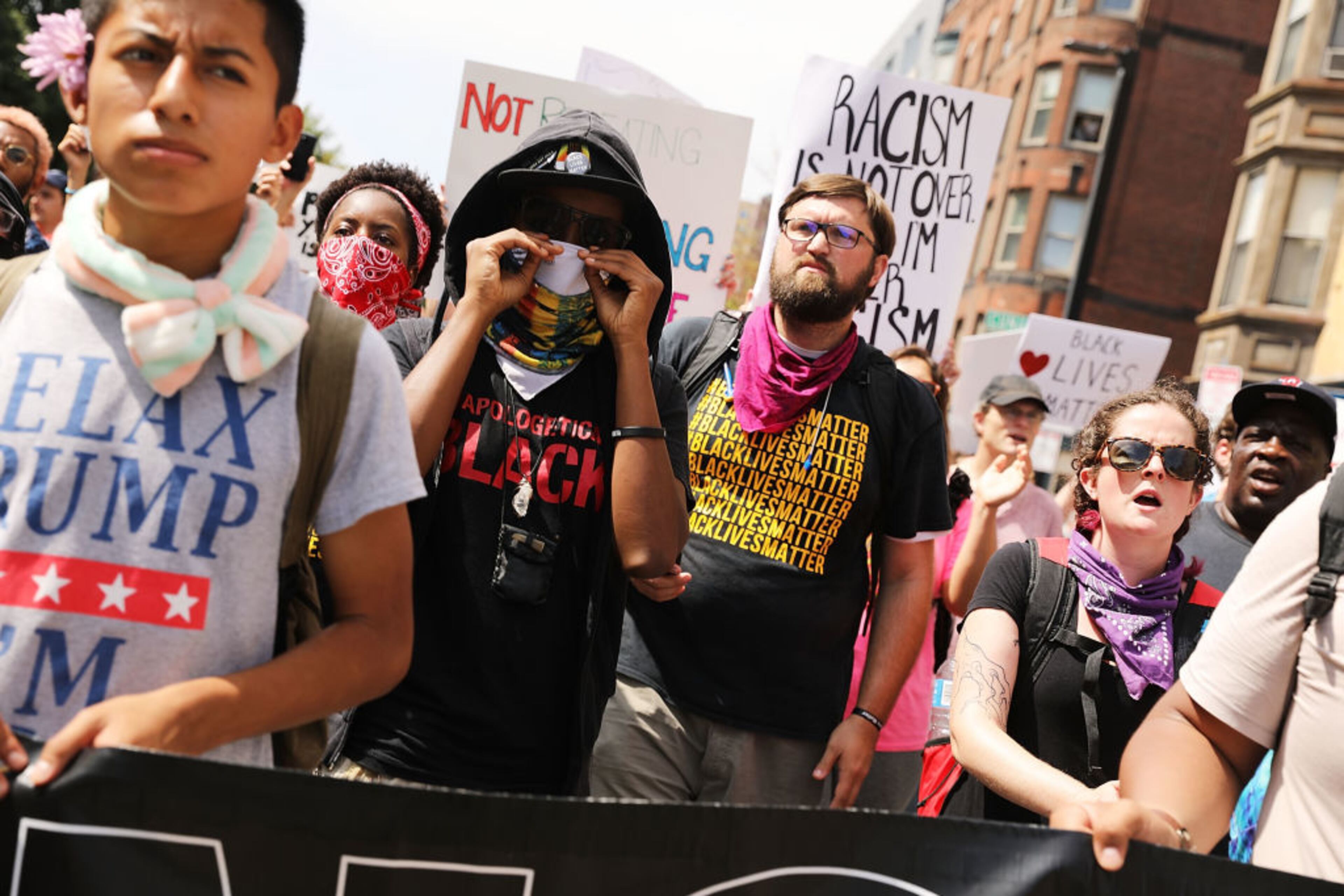 BOSTON, MA - AUGUST 19: Thousands of protesters march in Boston against a planned 'Free Speech Rally' just one week after the violent 'Unite the Right' rally in Virginia left one woman dead and dozens more injured on August 19, 2017 in Boston, United States. Although the rally organizers stress that they are not associated with any alt-right or white supremacist groups, the city of Boston and Police Commissioner William Evans are preparing for possible confrontations at the afternoon rally. (Photo by Spencer Platt/Getty Images)