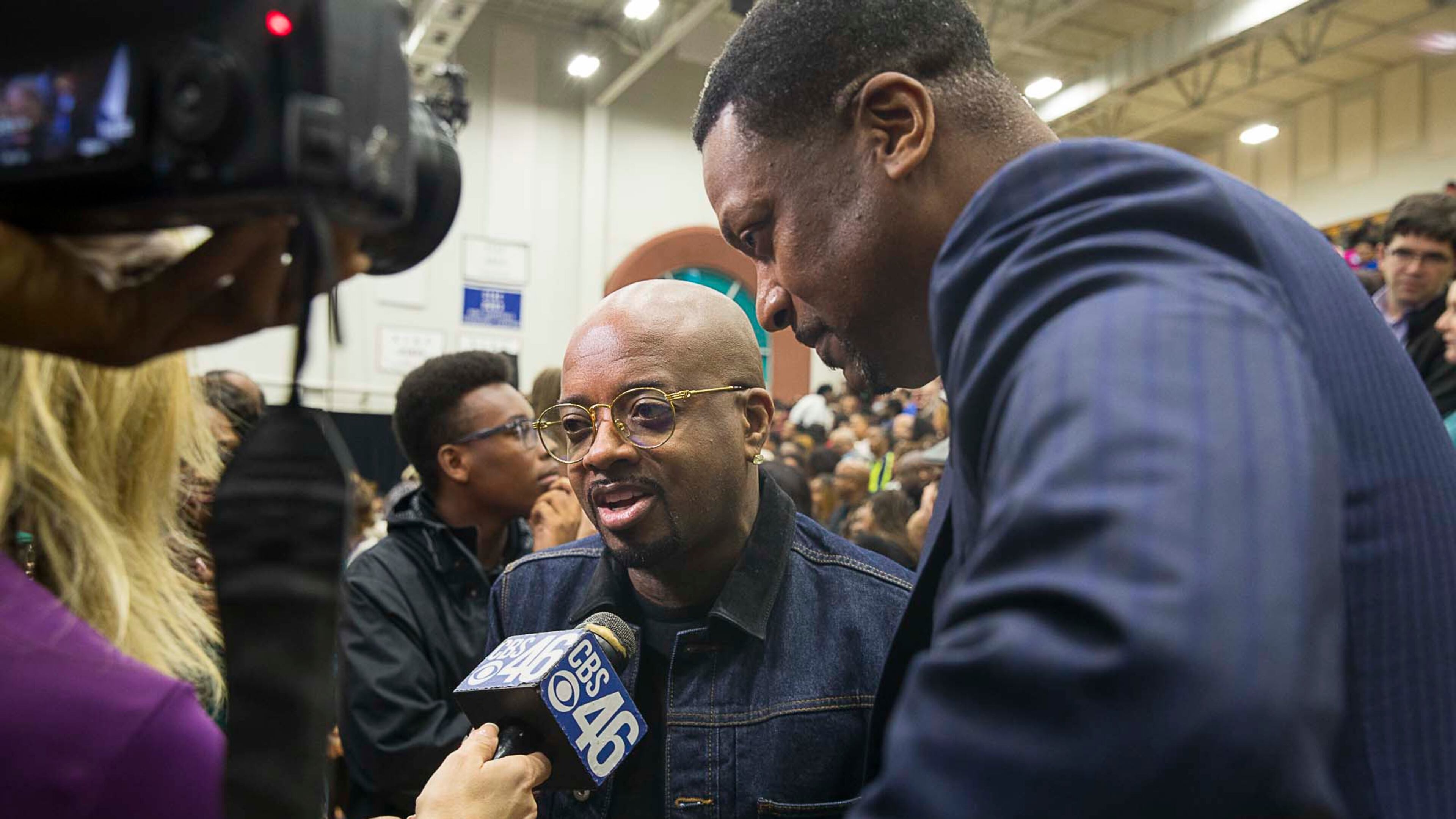 Actor Chris Tucker (right) and Rap mogul Jermaine Dupri (cener) answer questions from the media during a rally for gubernatorial candidate Stacey Abrams in Forbes Arena at Morehouse College, Friday, November 2, 2018. (ALYSSA POINTER/ALYSSA.POINTER@AJC.COM)