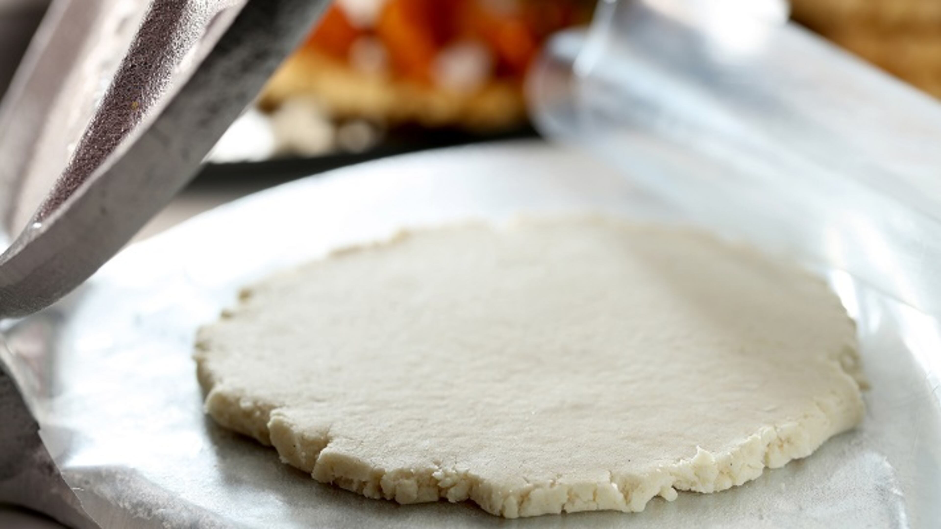Gorditas are masa dough disks, a good deal thicker than a tortilla. You can flatten them in a tortilla press, leaving them about 1/4- to 1/8-inch thick. Food styling by Mark Graham. (Michael Tercha/Chicago Tribune/TNS)