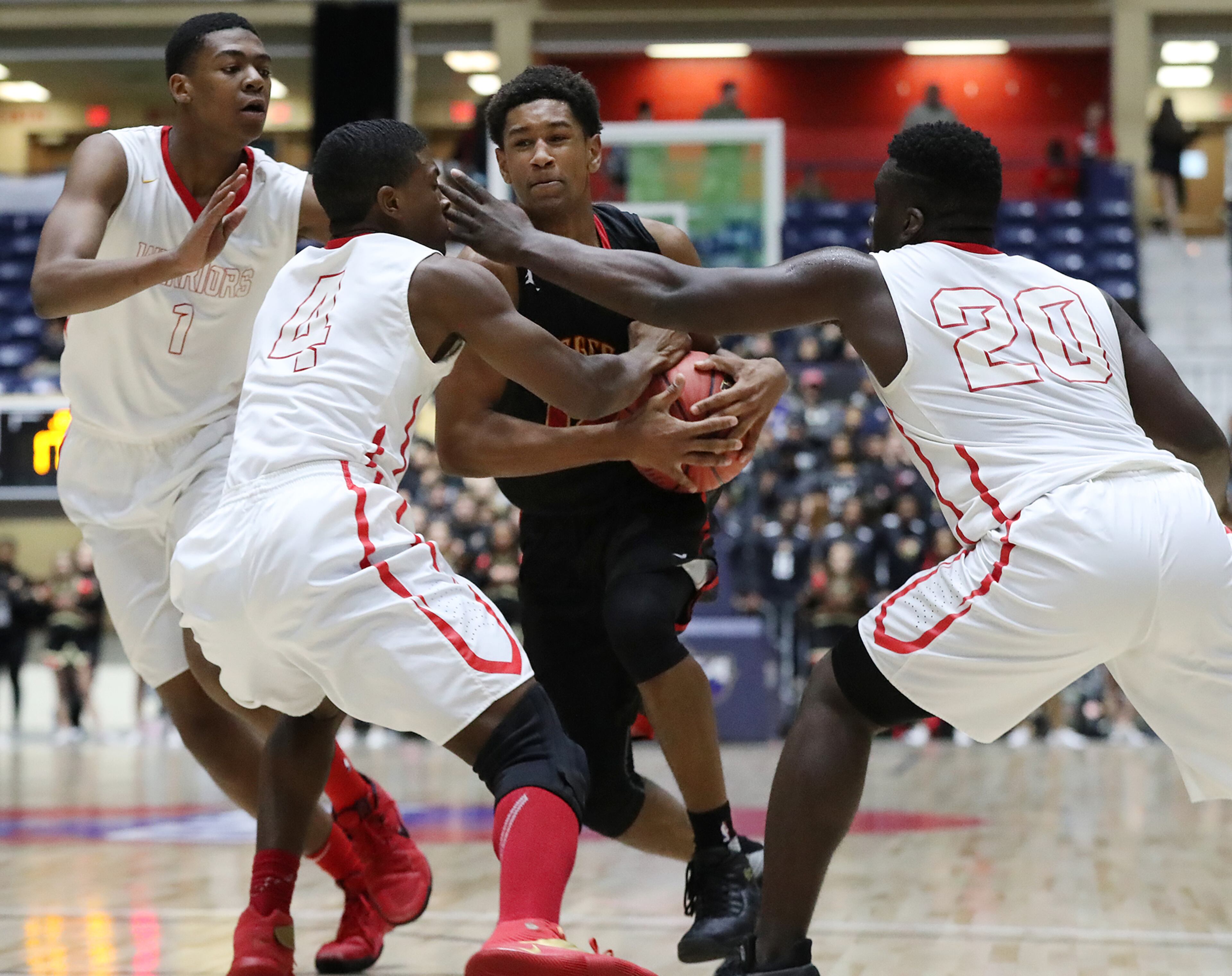 March 8, 2018 Macon: GAC guard Hunter McIntosh is triple teamed by Jenkins defeners in their GHSA state basketball championship game on Thursday, March 8, 2018, in Macon. Curtis Compton/ccompton@ajc.com