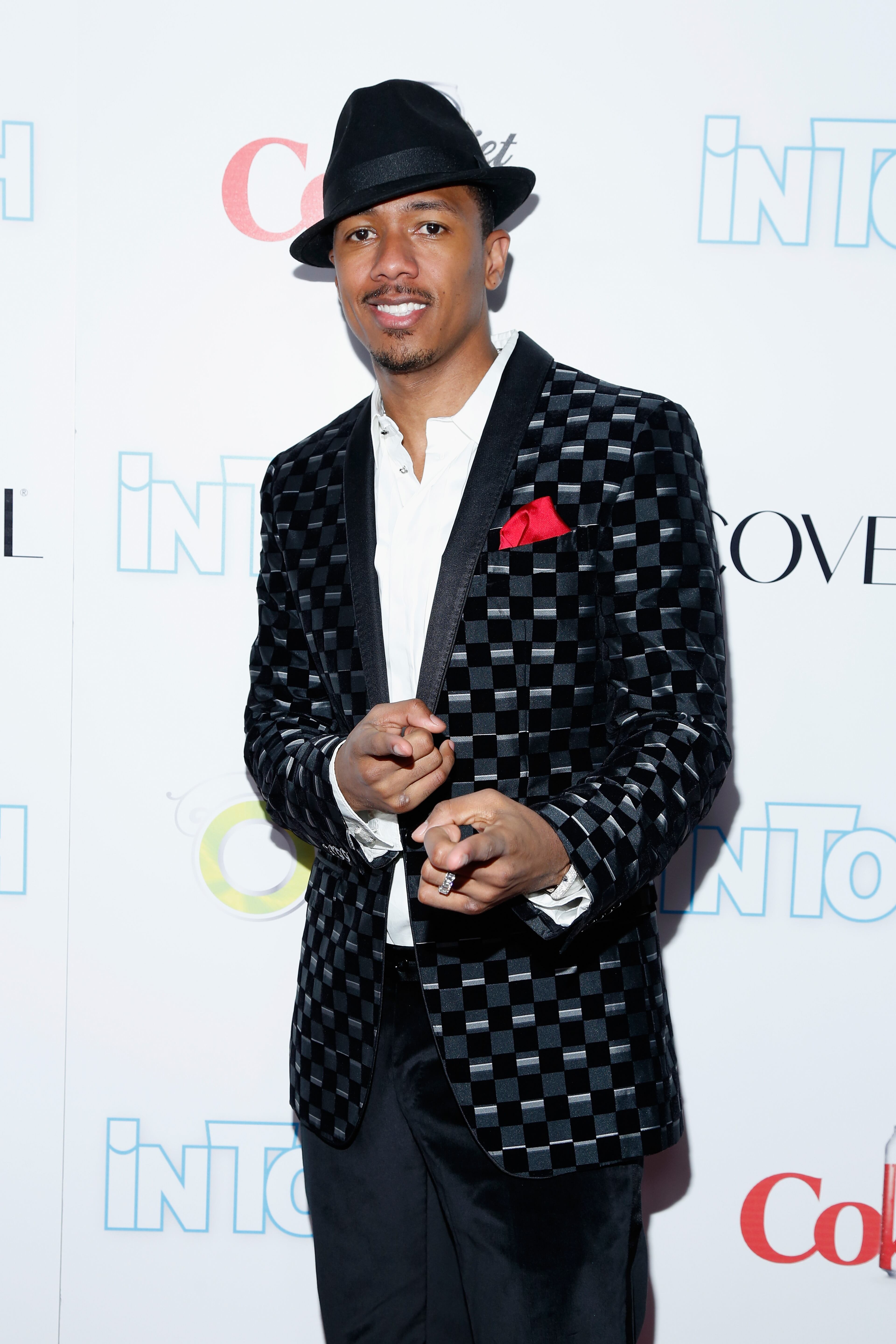 Nick Cannon arrives at Intouch Weekly's "ICONS & IDOLS Party" at FINALE Nightclub on August 25, 2013 in New York City. (Photo by Cindy Ord/Getty Images for Intouch Weekly)