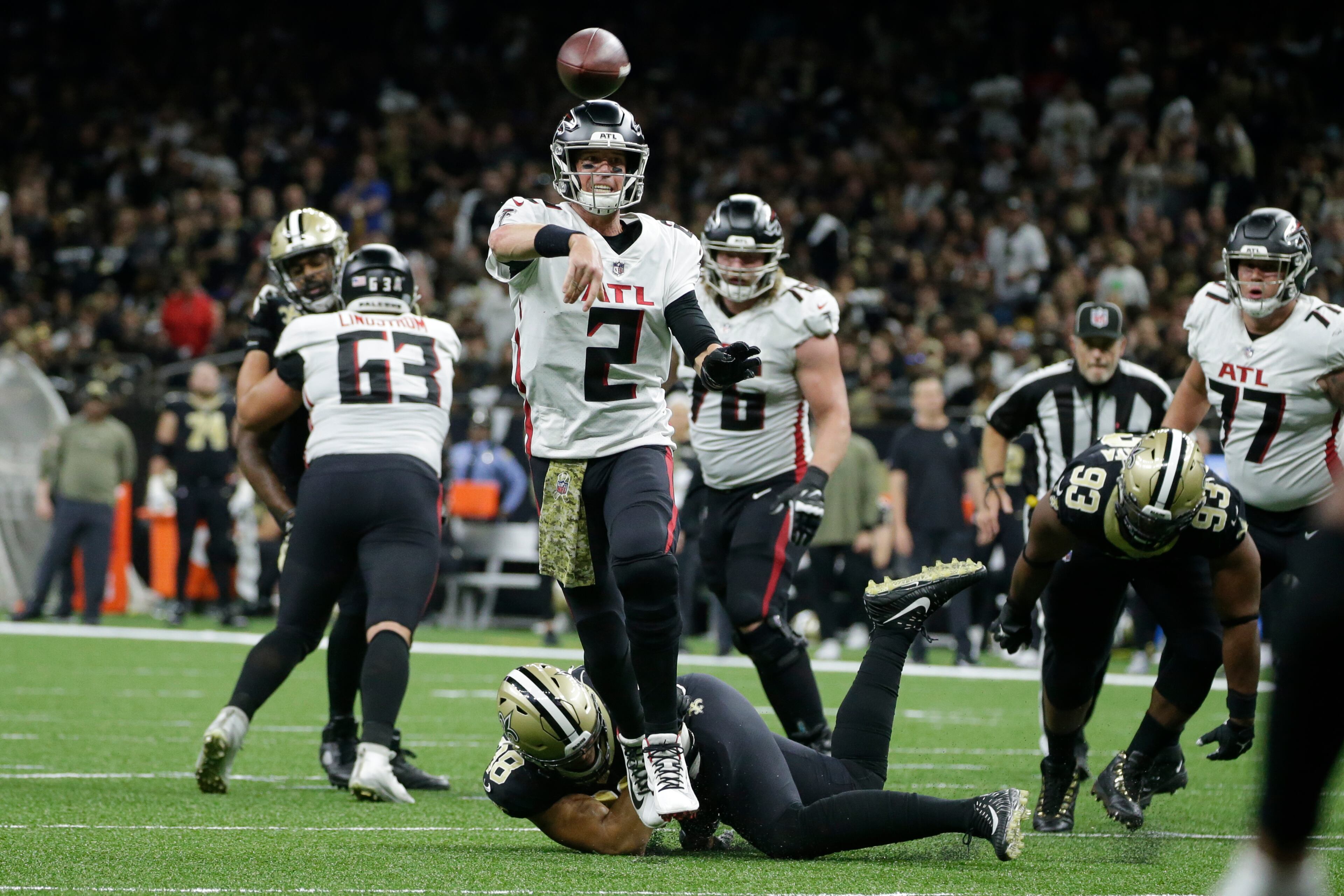 Atlanta Falcons quarterback Matt Ryan (2) runs against the New Orleans Saints during the first half of an NFL football game, Sunday, Nov. 7, 2021, in New Orleans. (AP Photo/Butch Dill)