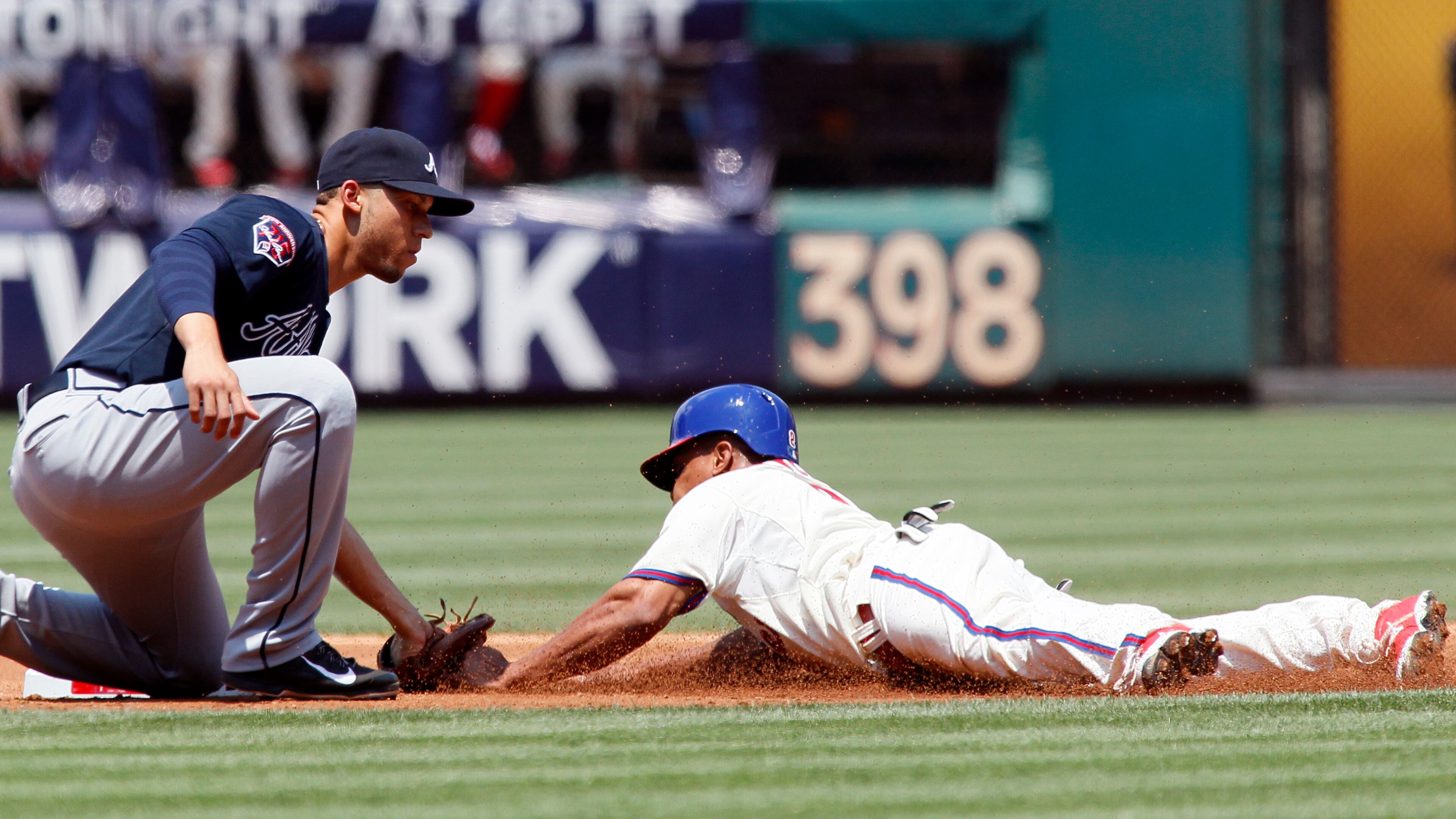 You don't see much action like this at baseball games. (AP Photo/Tom Mihalek)