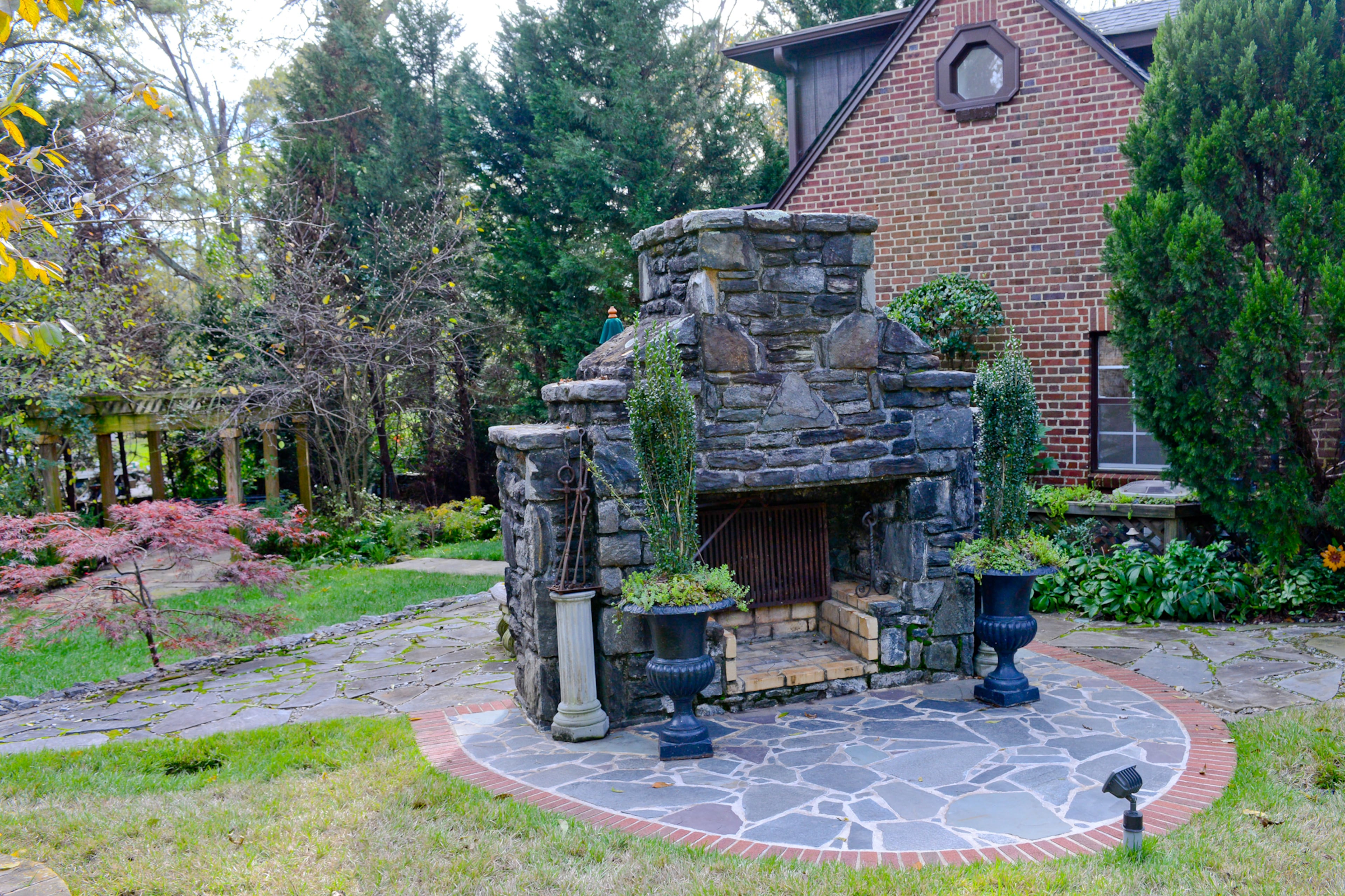 When they Keenan and Danielle Nix purchased their home and 1.4-acre lot in East Lake, the grounds were so overgrown that they didn't know a 20-foot handcrafted stone fireplace in the yard even existed. Today, it's a prominent feature.