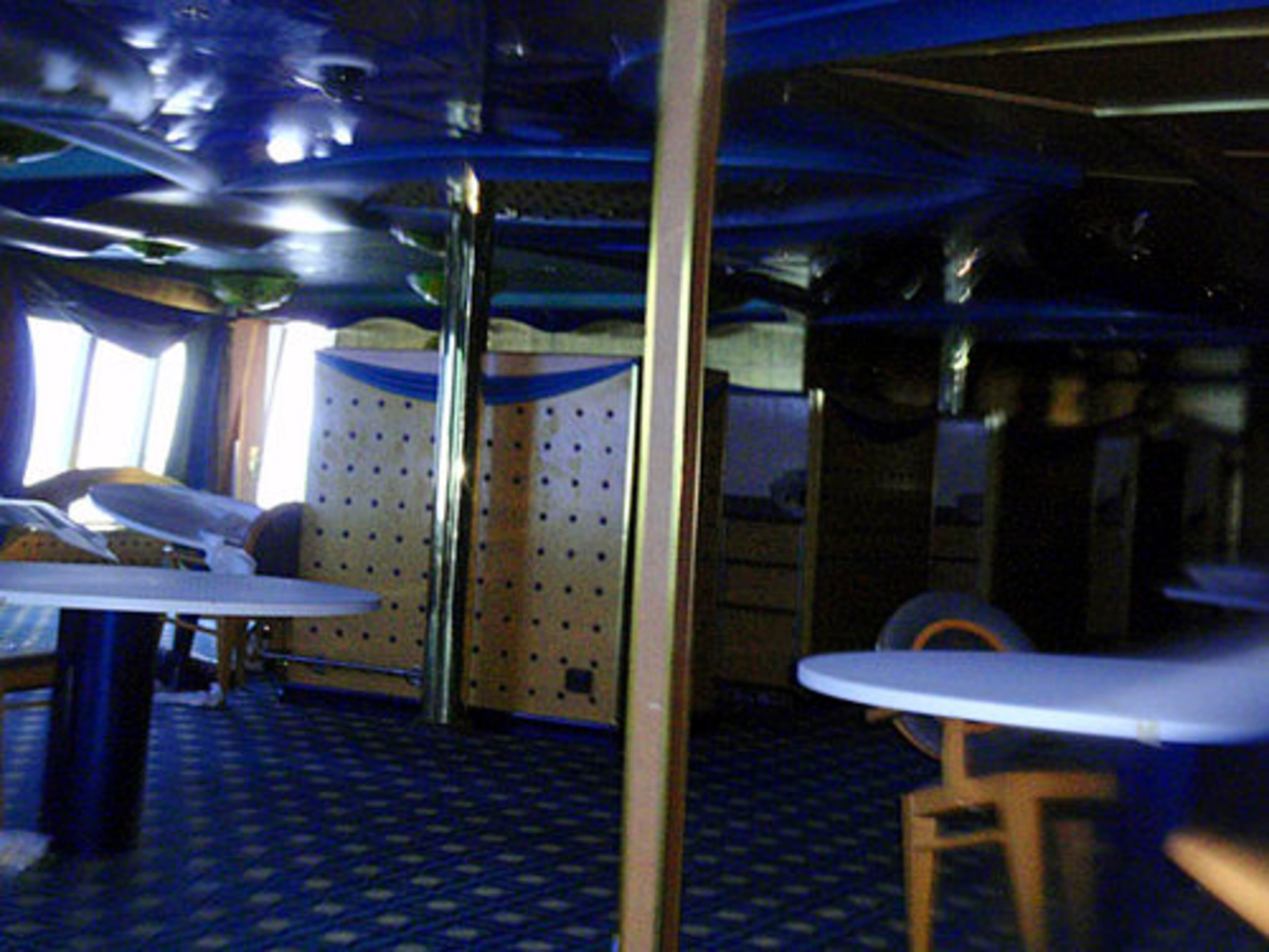 In this photo released by the Italian Coast Guard Monday, Jan. 16, 2012 chairs and tables are seen inside the cruise ship Costa Concordia.