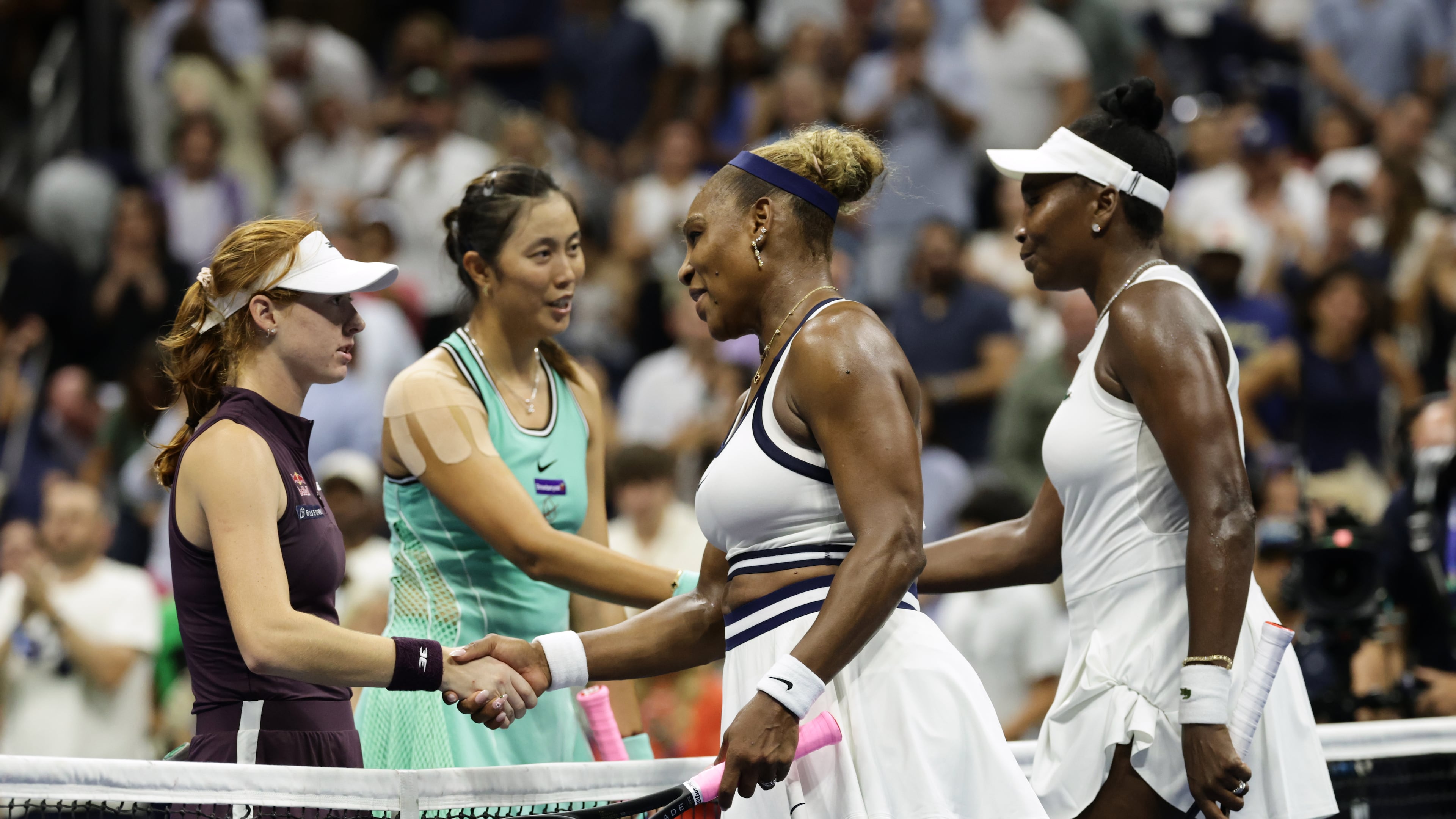 Venus, right, and Serena Williams, of the United States, congratulate Maya Joint, left, of Australia, and Hao-Ching Chan, of Taiwan, after their women's doubles match at the U.S. Open tennis championships, Friday, Sept. 4, 2026, in New York. (AP Photo/Adam Hunger)