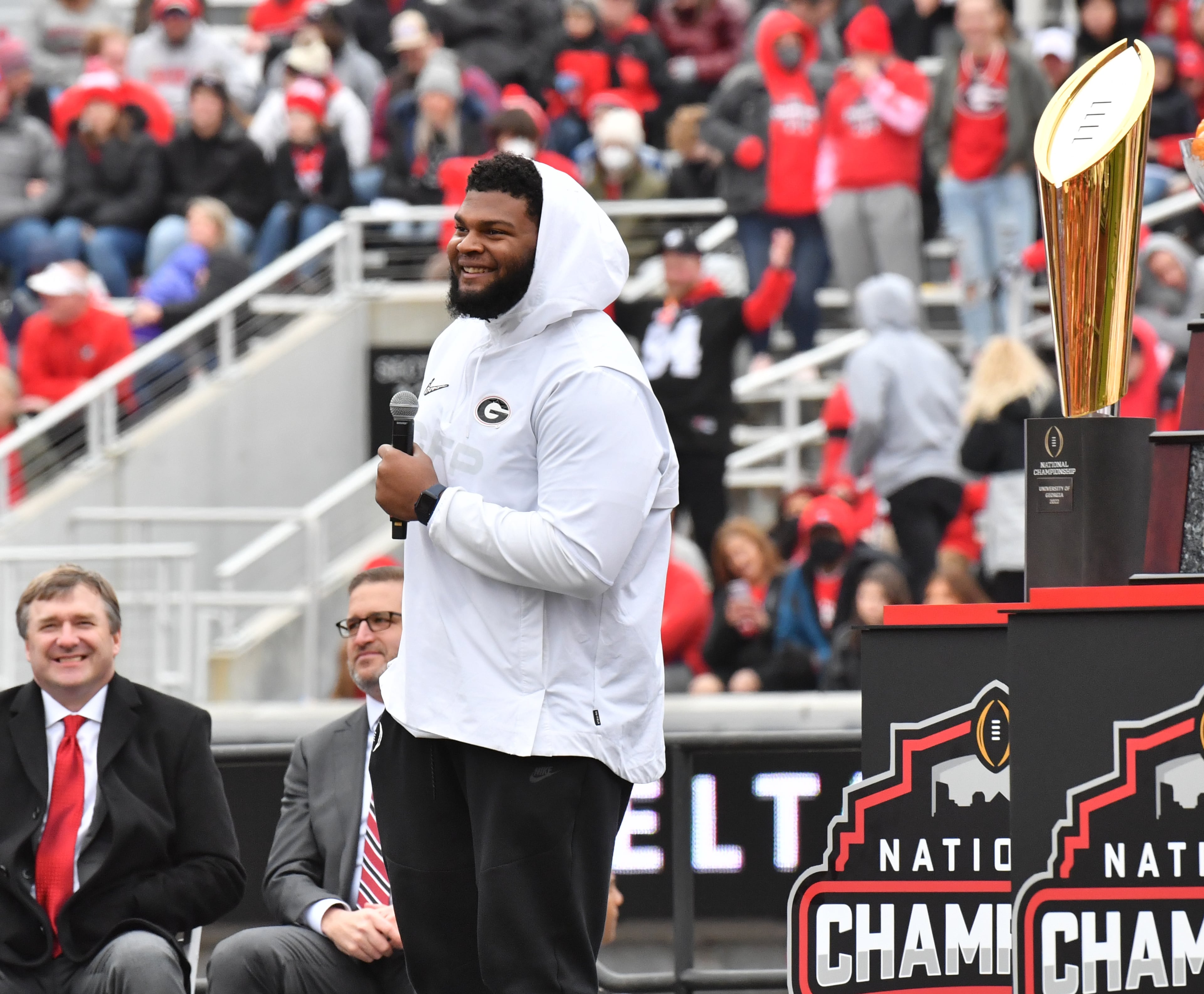 January 15, 2022 Athens - Georgia's offensive lineman Jamaree Salyer reacts as he speaks on the stage during the celebration of Georgia’s College Football Playoff national championship at Sanford Stadium in Athens on Saturday, January 15, 2022. Georgia captured the national championship, its first since the 1980 season, with a 33-18 victory over Alabama at Lucas Oil Stadium in Indianapolis. (Hyosub Shin / Hyosub.Shin@ajc.com)