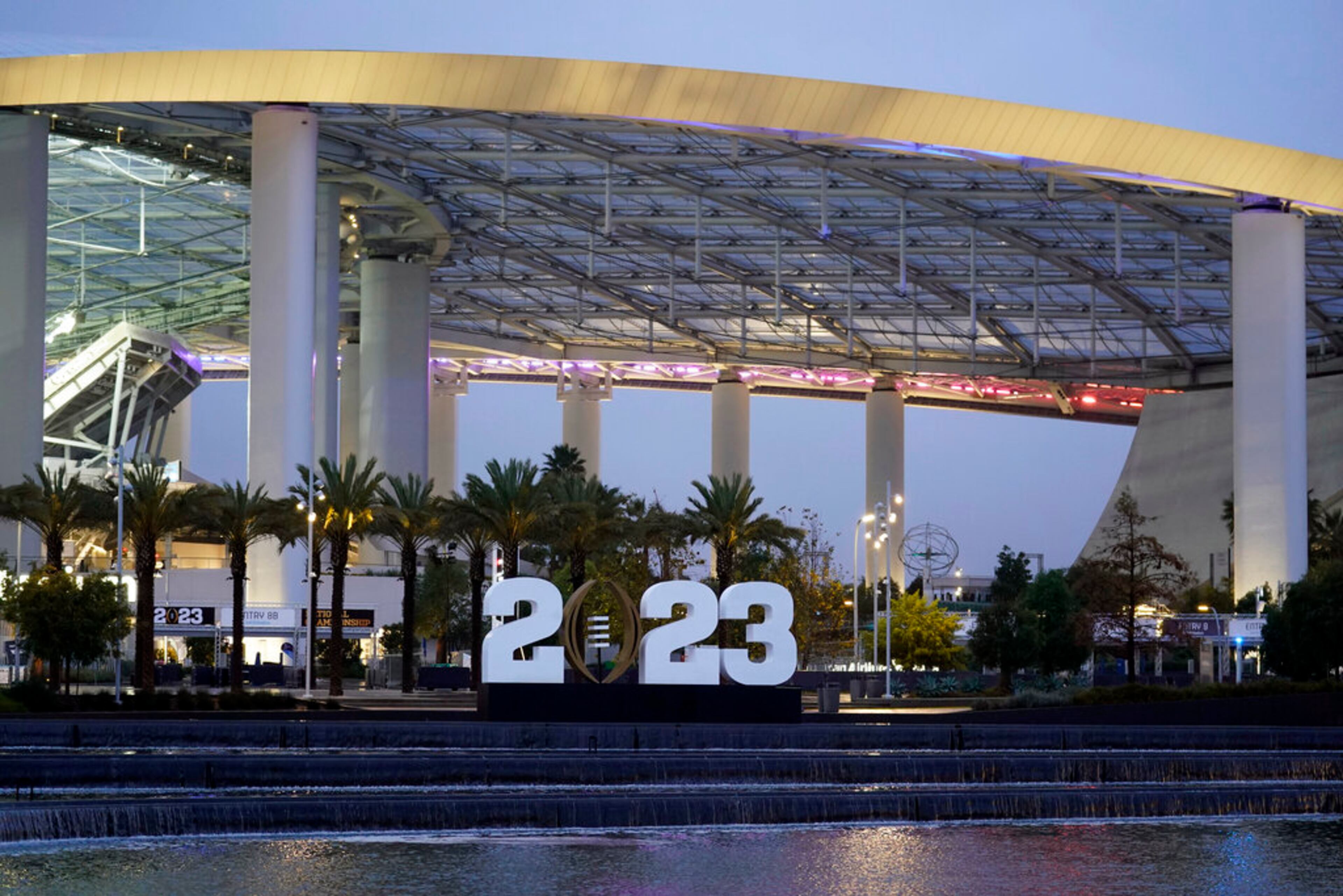SoFi Stadium is decorated Wednesday, Jan. 4, 2023, with the CFP logo ahead of the CFP national championship game in Inglewood, Calif. Georgia faces TCU Monday for the title. (AP Photo/Marcio Jose Sanchez)