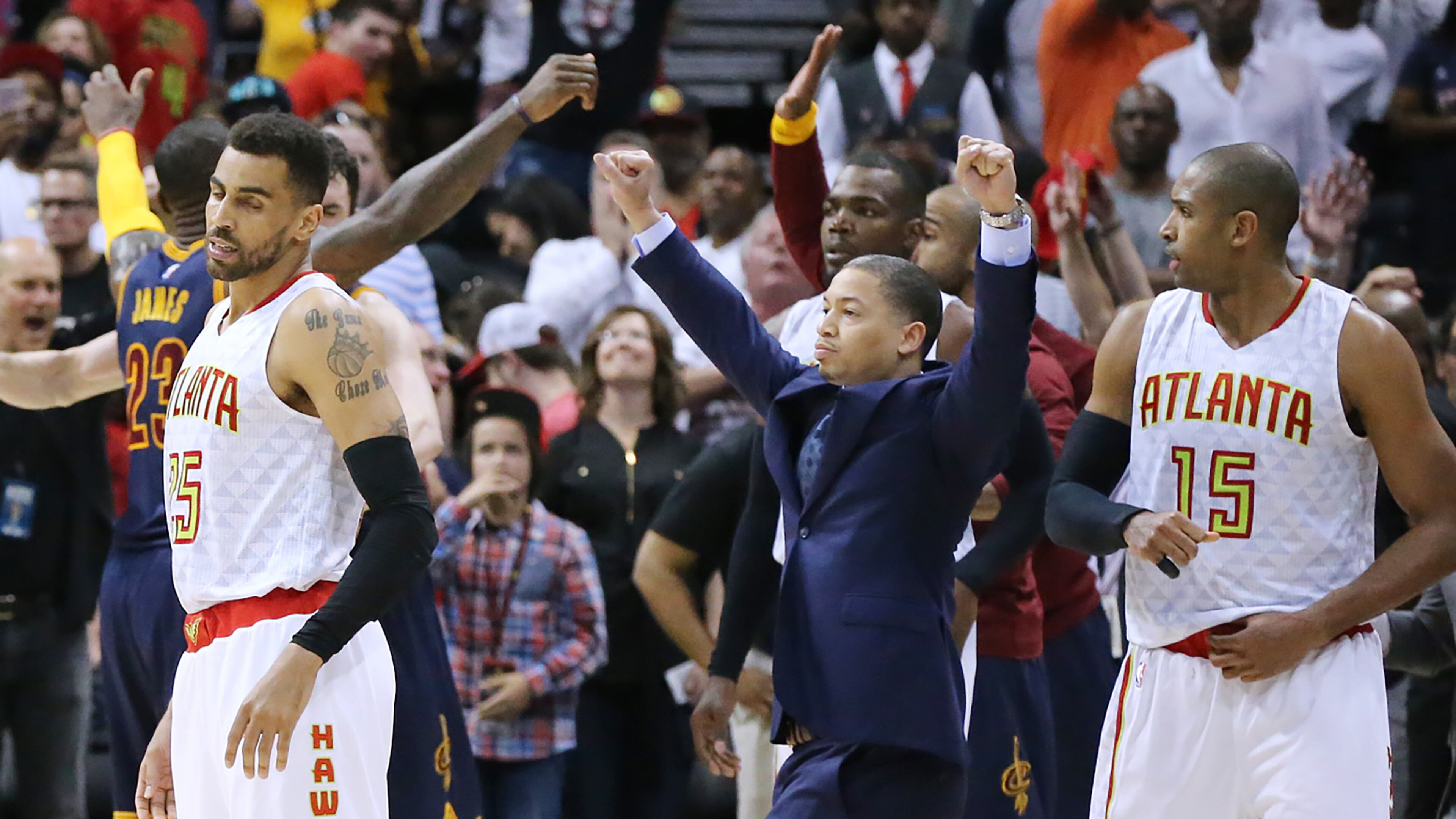 050816 ATLANTA: Hawks Thabo Sefolosha (from left), Paul Millsap, and Al Horford react as Cavaliers LeBron James, and head coach Tyronn Lue celebrate a 100-99 victory to sweep the series 4 games to 0 as time expires in Game 4 of a second-round NBA basketball playoff series at Philips Arena on Sunday, May 8, 2016, in Atlanta. Curtis Compton / ccompton@ajc.com