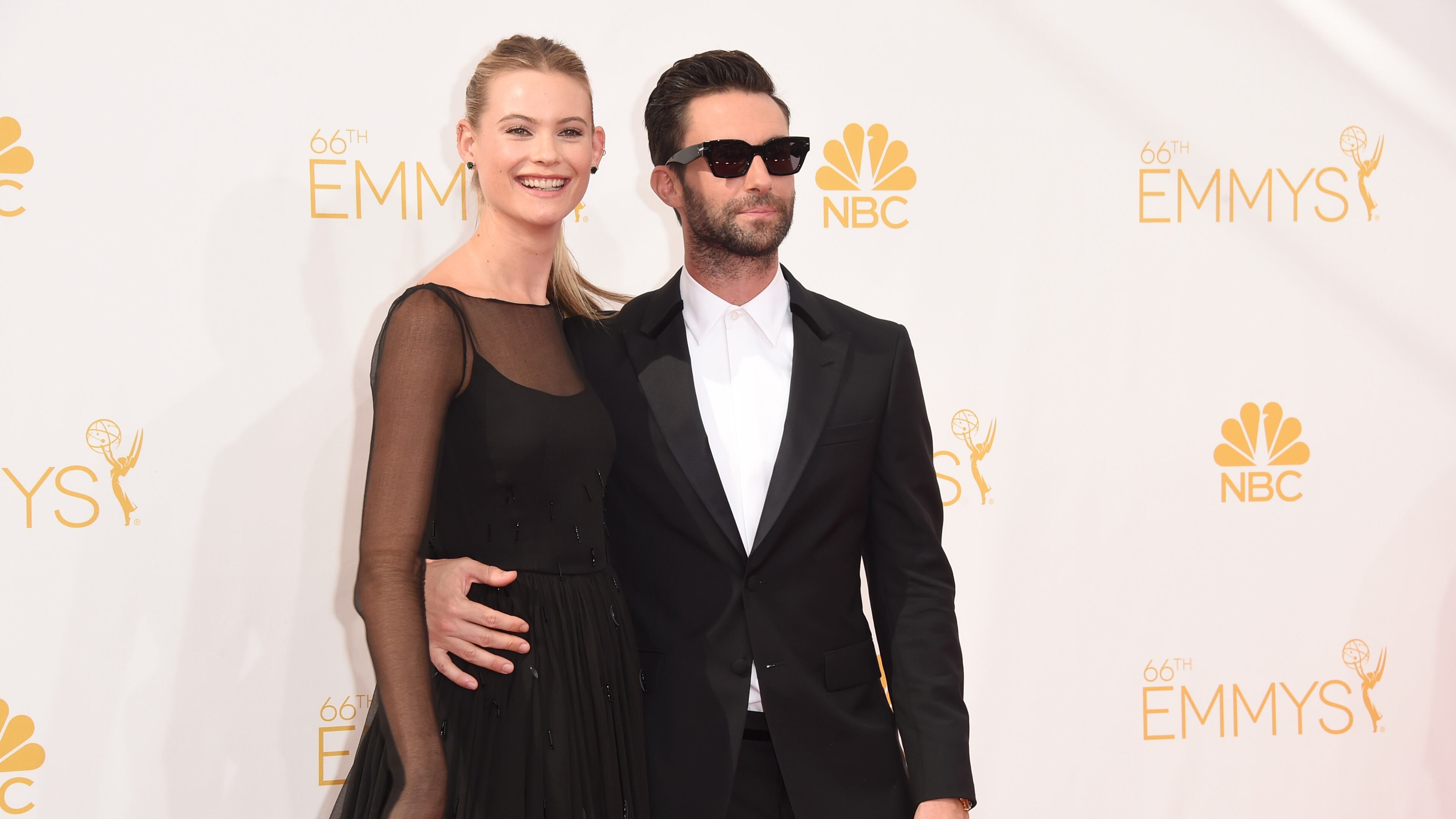 LOS ANGELES, CA - AUGUST 25: Singer Adam Levine (R) and model Behati Prinsloo attend the 66th Annual Primetime Emmy Awards held at Nokia Theatre L.A. Live on August 25, 2014 in Los Angeles, California. (Photo by Jason Merritt/Getty Images)