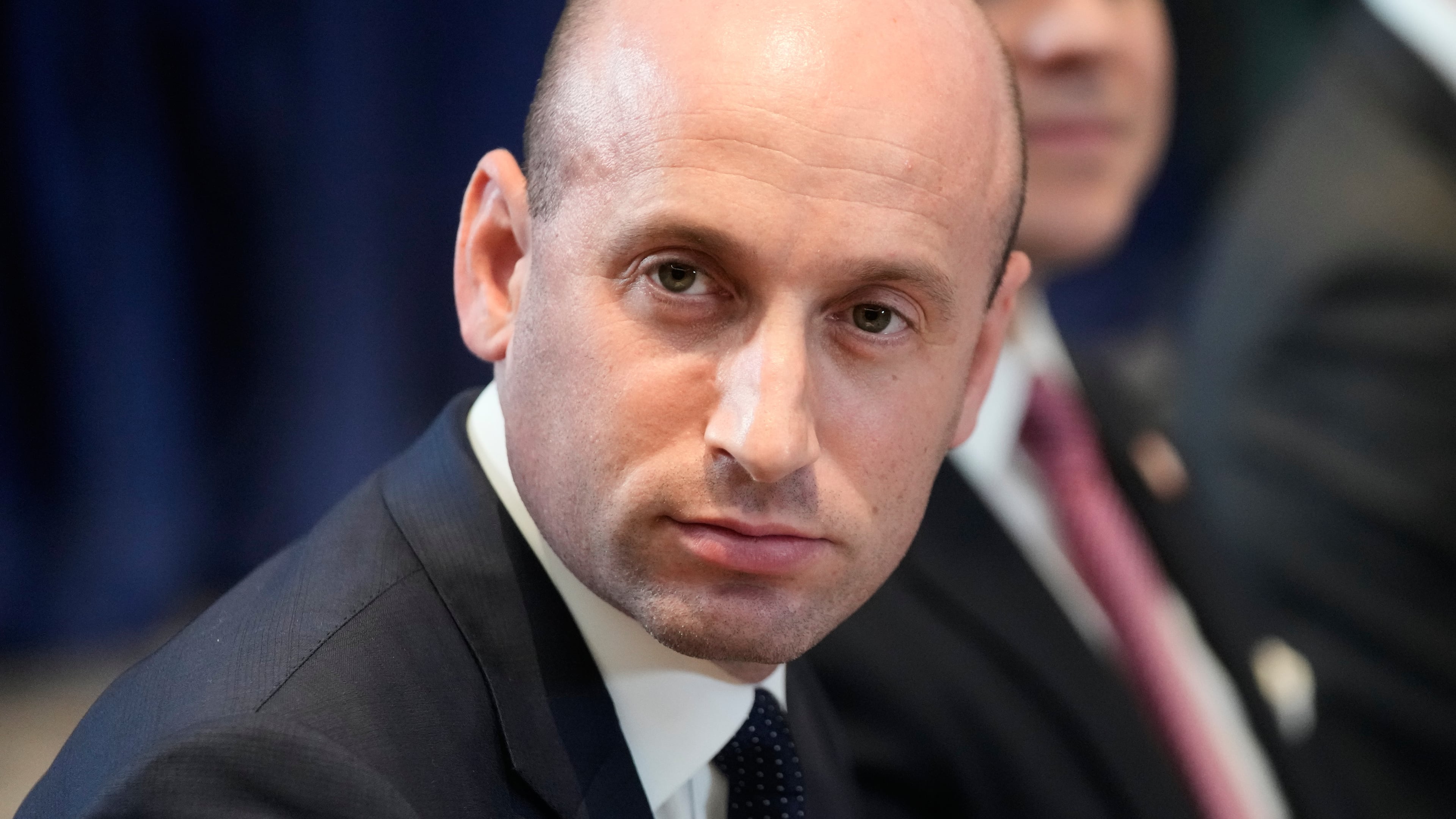 FILE - United States Homeland Security Advisor Stephen Miller reacts on the sidelines of the ASEAN Summit in Kuala Lumpur, Malaysia, Sunday, Oct. 26, 2025. (AP Photo/Mark Schiefelbein), File)