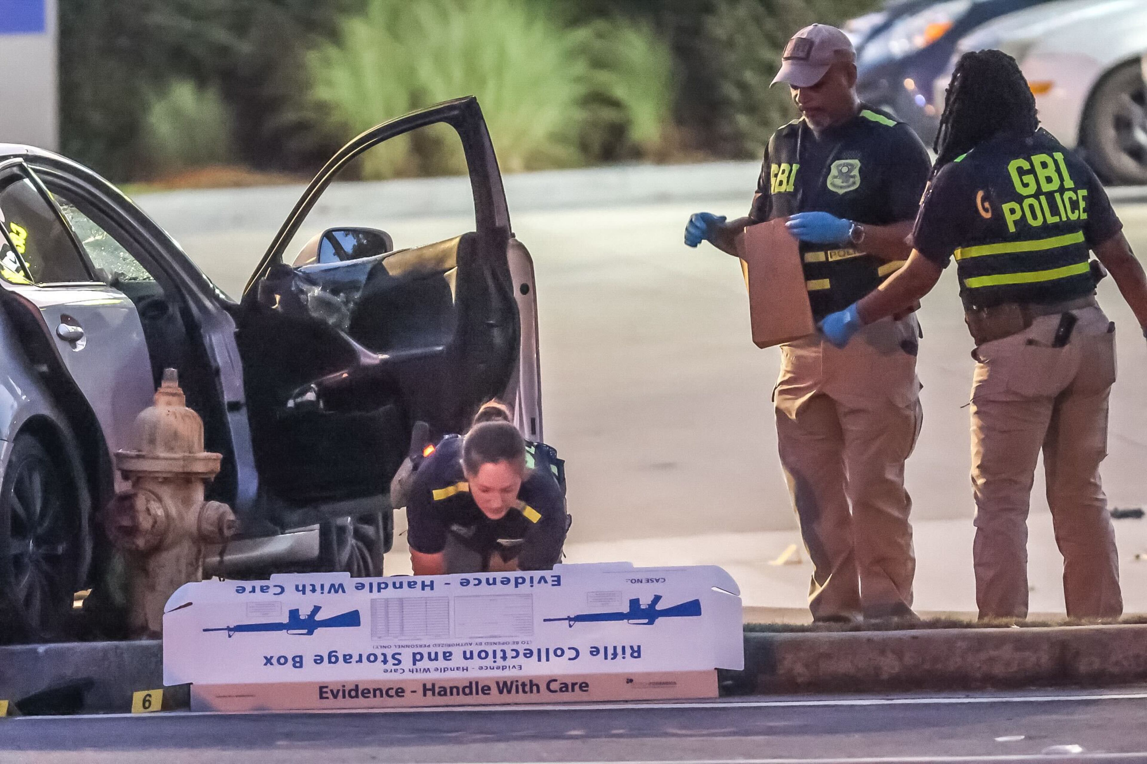 GBI agents are investigating Friday morning after a burglary call led to a pursuit, crash and subsequent shootout with Brookhaven police the night before, officials said. (John Spink/AJC)