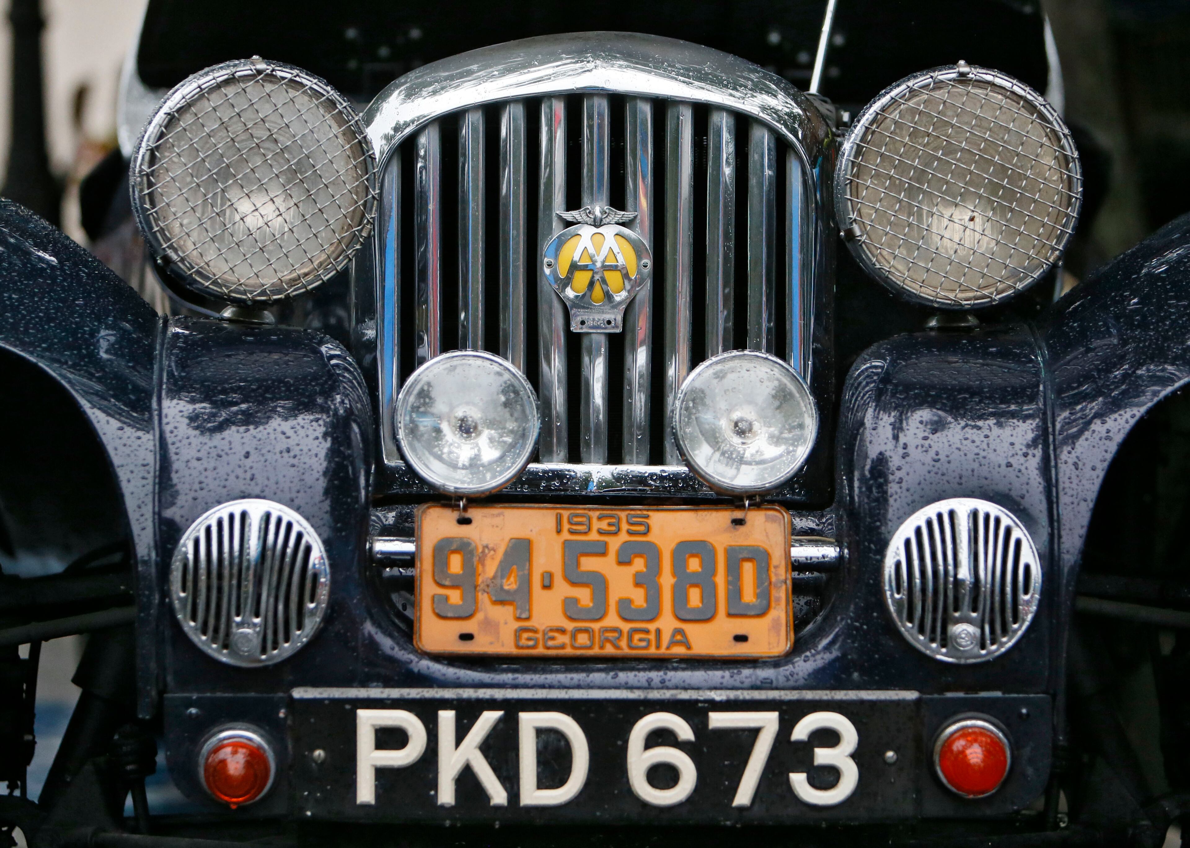 This 1951 Jaguar XK-120, owned by James Strickland, was modified to have a 1935 era body. The History Marietta Classic Car Show had fewer cars because of the rain, but still attracted a fair number of viewers. Rain dampened the turnout for the 22nd annual Marietta Streetfest held on the Marietta Square Saturday. The event is a fundraiser for the Marietta Museum of History and featured antique dealers and artists, the Marietta Square Farmers Market, the Hubcaps and History Marietta Classic Car Show and the Marietta Grassroots Music Festival.