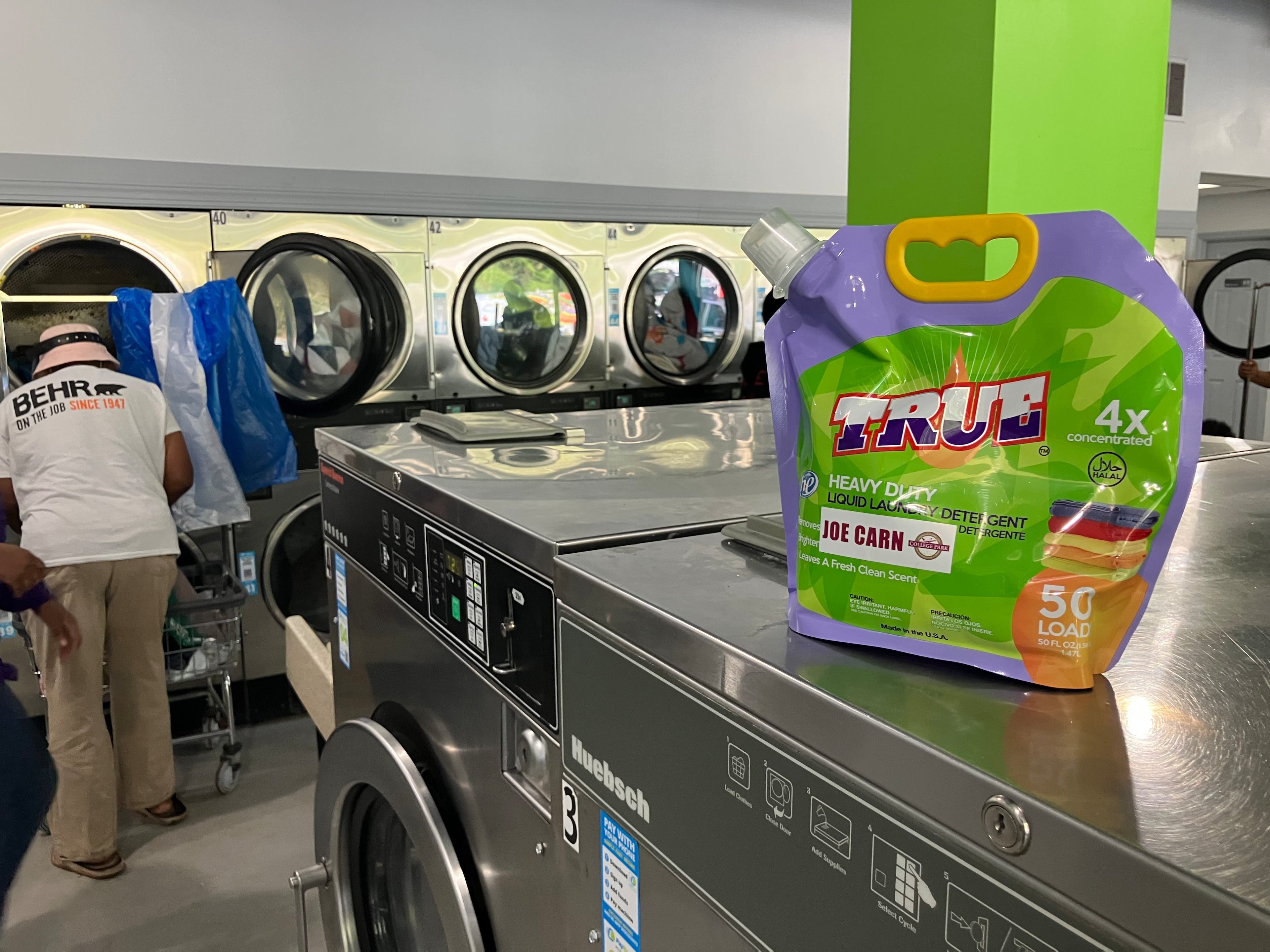 College Park City Councilman Joe Carn, who is running for reelection, held a free laundry event Saturday, during early voting in Georgia's municipal elections. Carn used city funds for the laundry detergent, which has his name on it. (Reed Williams/AJC)
