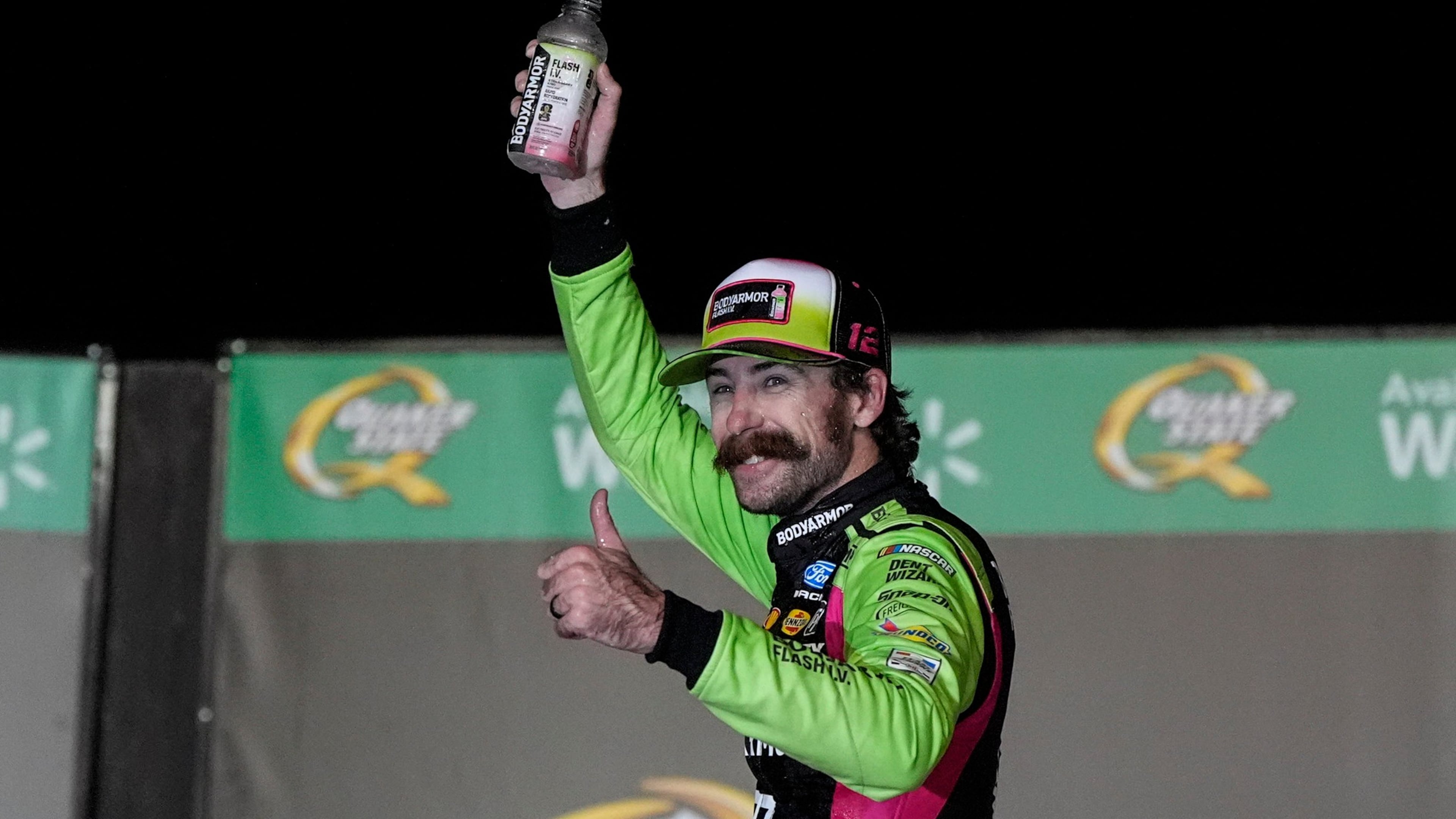 Ryan Blaney celebrates after winning a NASCAR Cup Series auto race, Sunday, July 12, 2026, in Hampton, Ga. (AP Photo/Mike Stewart)