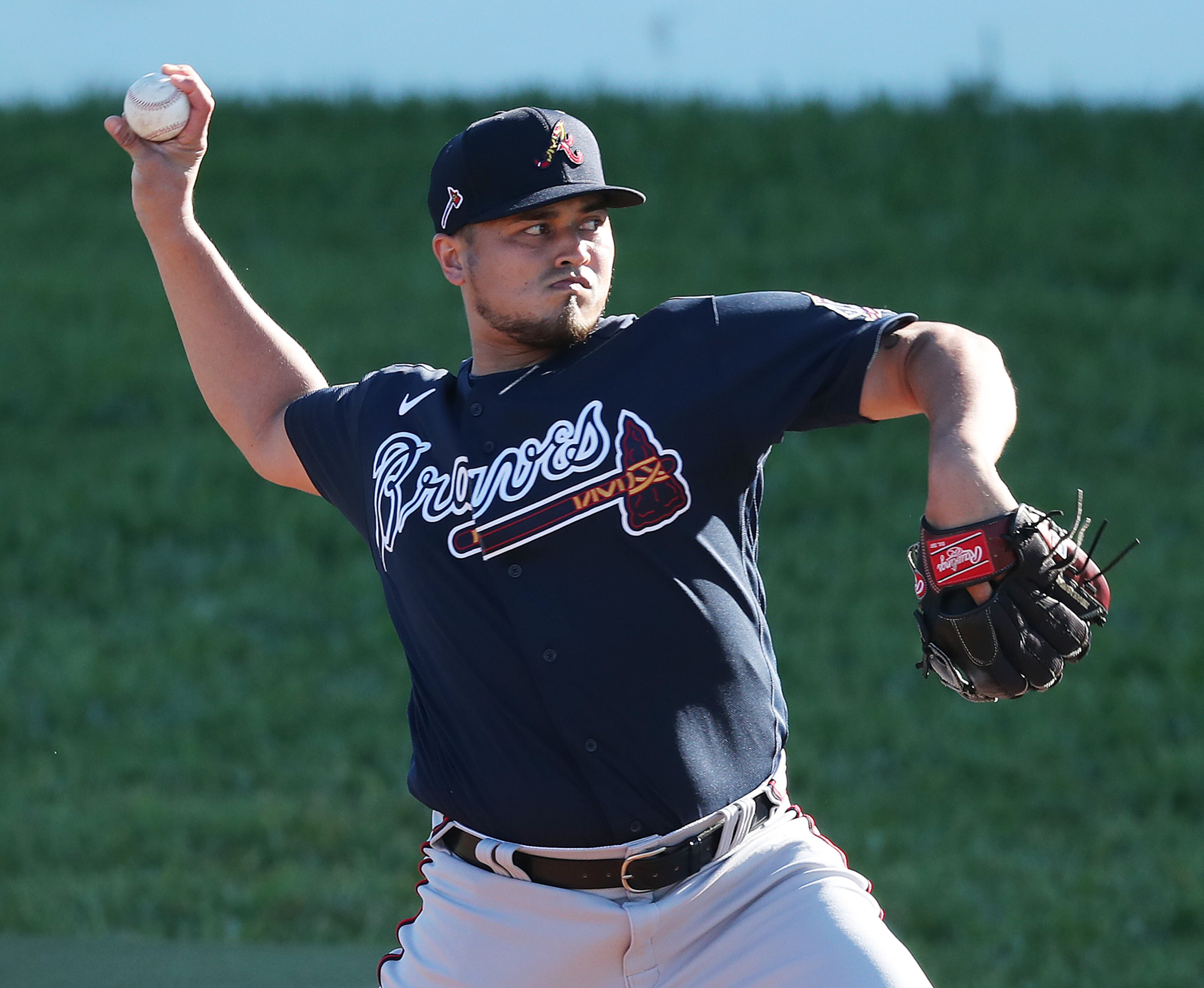 022521 North Port: Atlanta Braves pitcher Víctor Arano throws from the practice mounds during spring training at CoolToday Park on Thursday, Feb. 25, 2021, in North Port. Curtis Compton / Curtis.Compton@ajc.com”